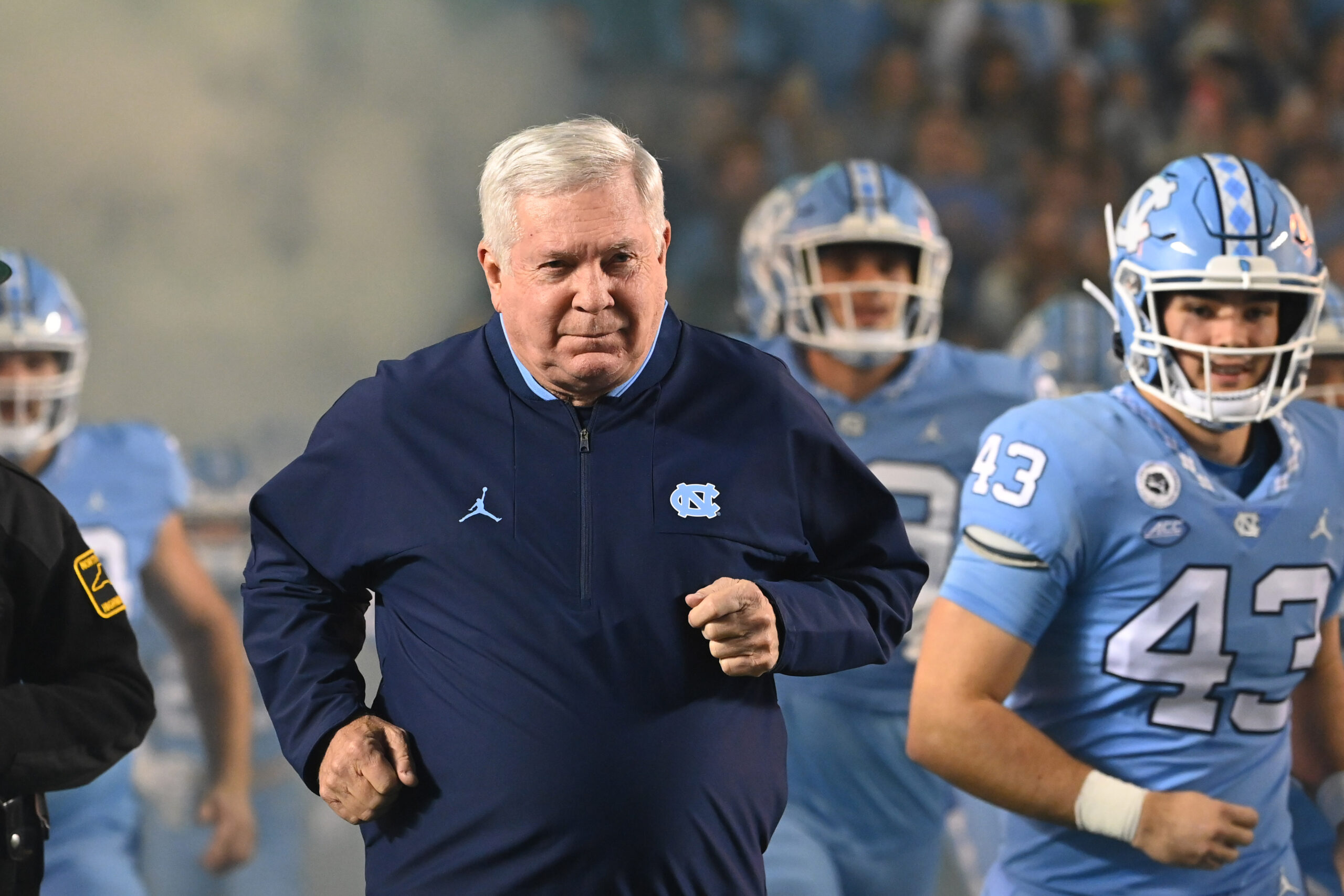 Oct 29, 2022; Chapel Hill, North Carolina, USA; North Carolina Tar Heels head coach Mack Brown runs on to the field before the game at Kenan Memorial Stadium.