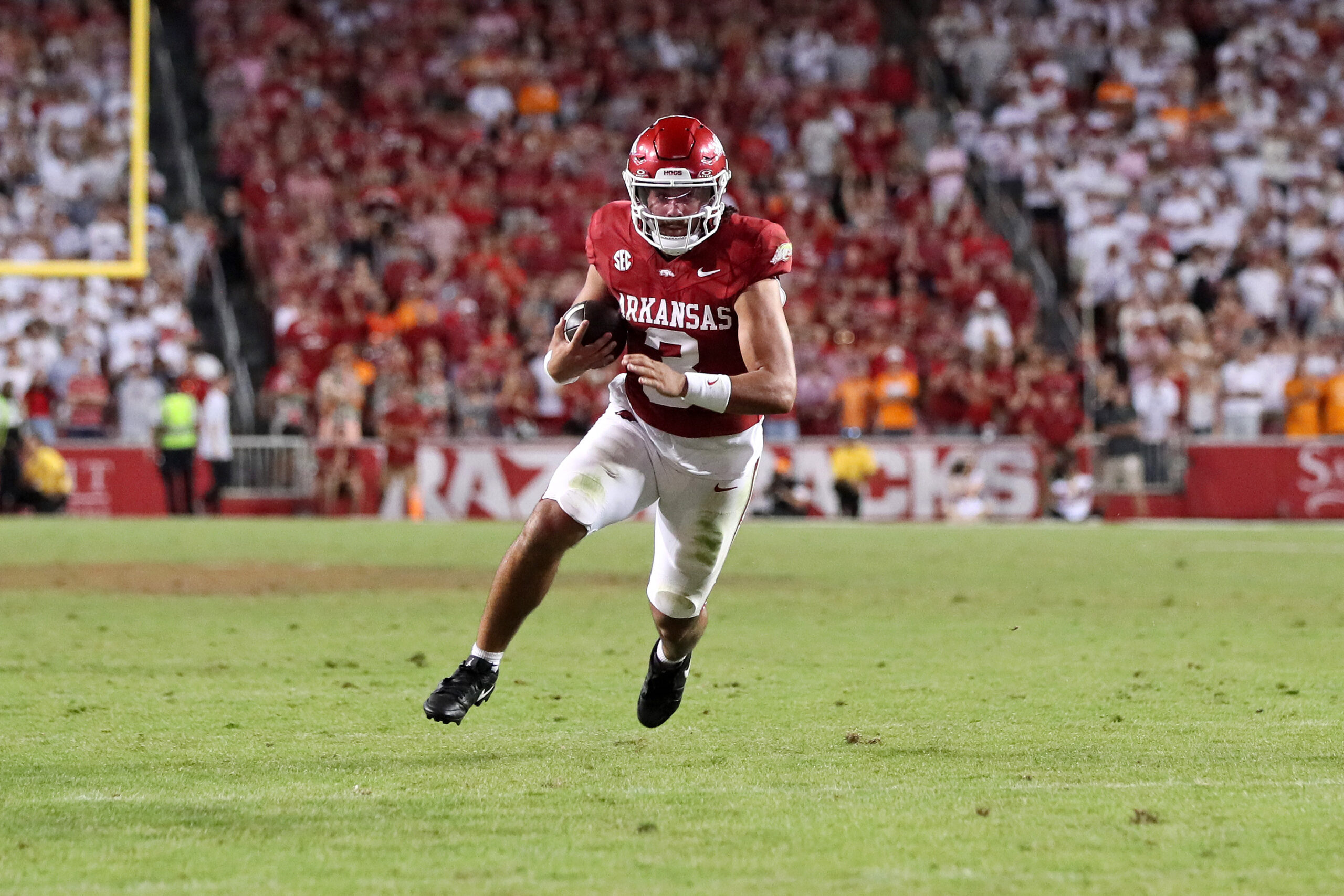 Oct 5, 2024; Fayetteville, Arkansas, USA; Arkansas Razorbacks quarterback Malachi Singleton (3) rushes for touchdown in the fourth quarter against the Tennessee Volunteers at Donald W. Reynolds Razorback Stadium. Arkansas won 19-14.