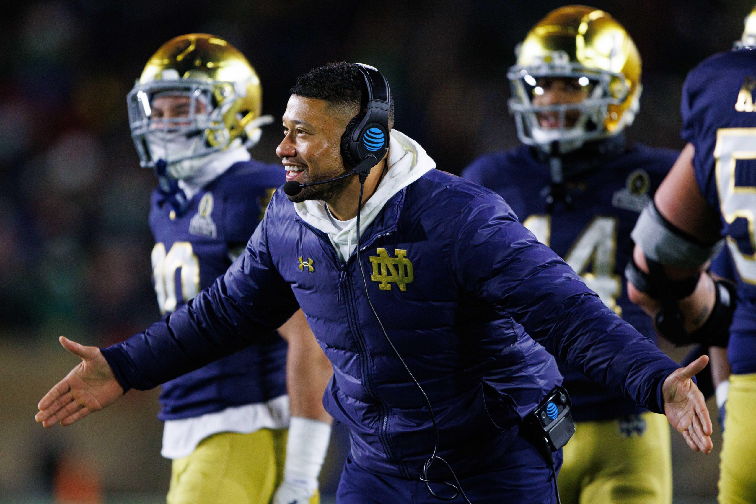 Notre Dame head coach Marcus Freeman celebrates a touchdown scored during the first round of the College Football Playoff between Notre Dame and Indiana.