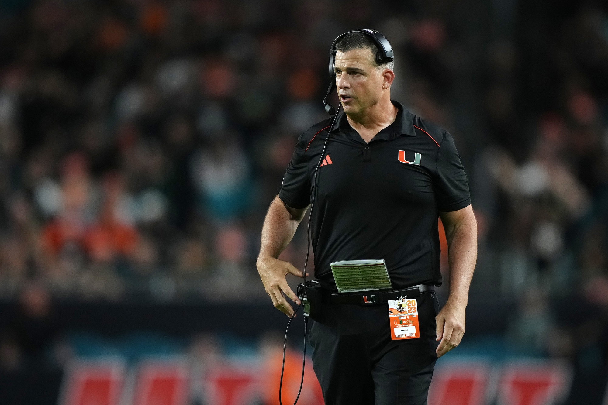 Oct 7, 2023; Miami Gardens, Florida, USA; Miami Hurricanes head coach Mario Cristobal walks on the field in the second half against the Georgia Tech Yellow Jackets at Hard Rock Stadium.