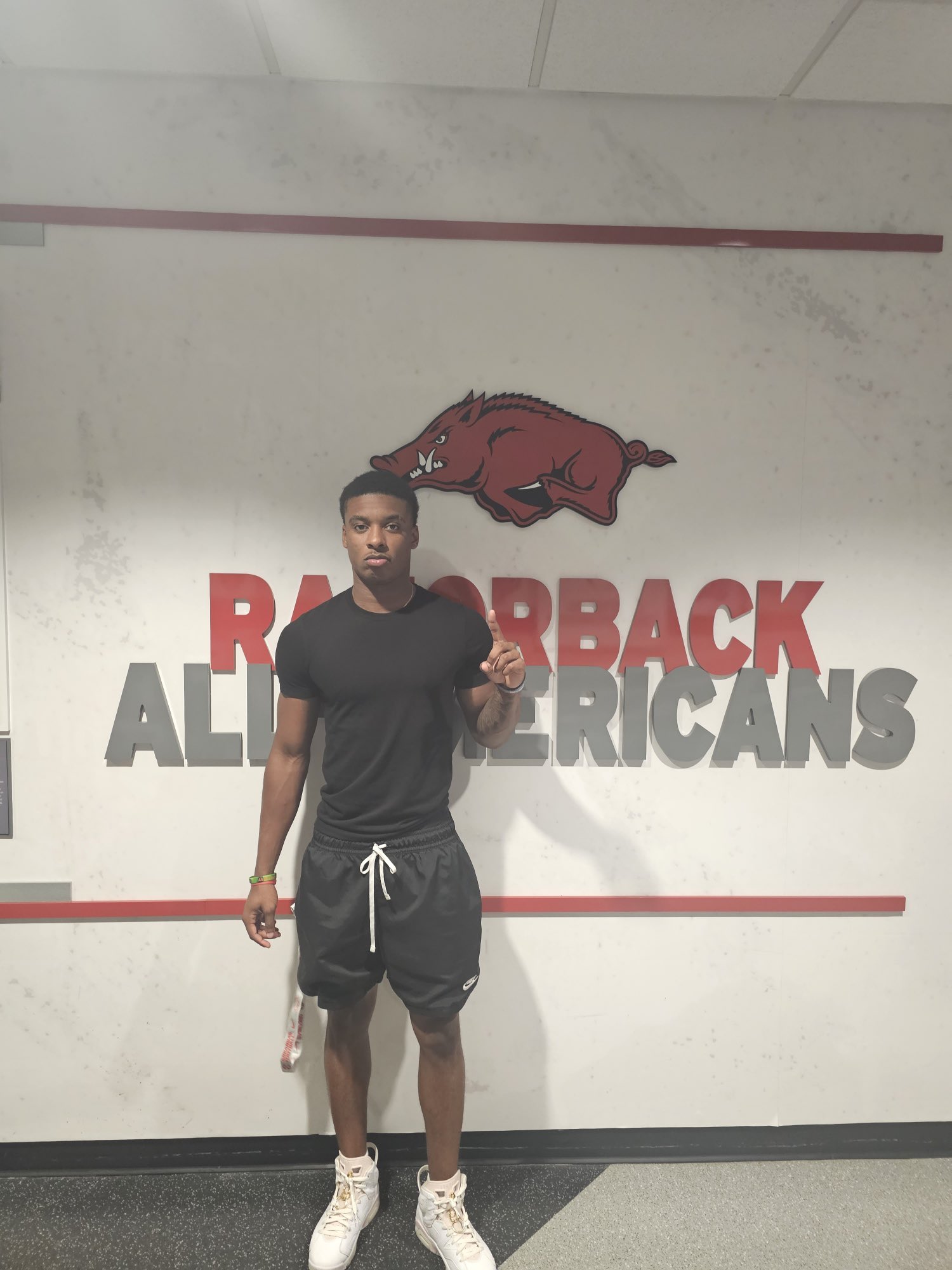 2025 (3)-star RB Markeylin Batton from Atlanta, Texas taking a picture during a visit to Arkansas