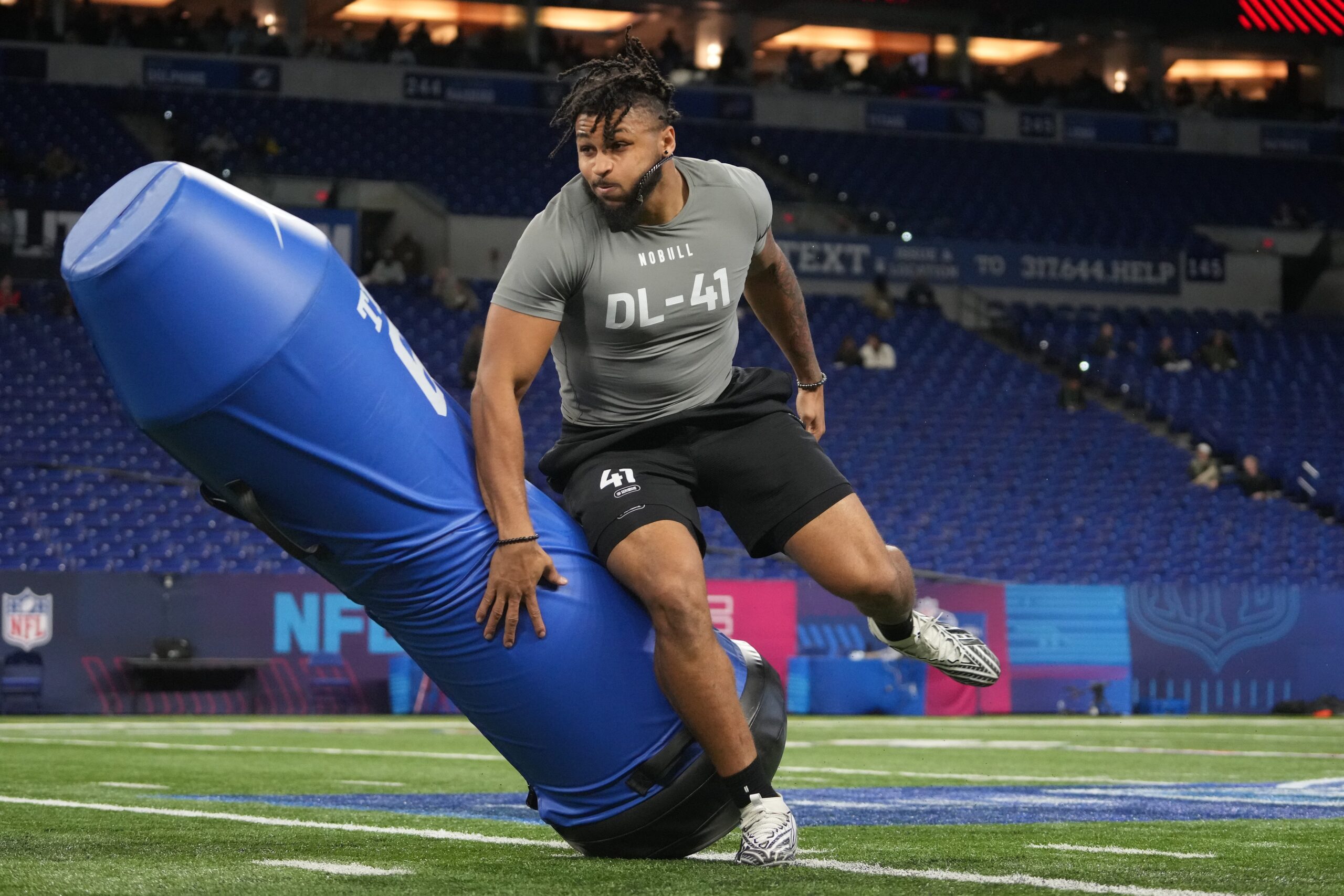 Feb 29, 2024; Indianapolis, IN, USA; Western Michigan defensive lineman Marshawn Kneeland (DL41) works out during the 2024 NFL Combine at Lucas Oil Stadium.