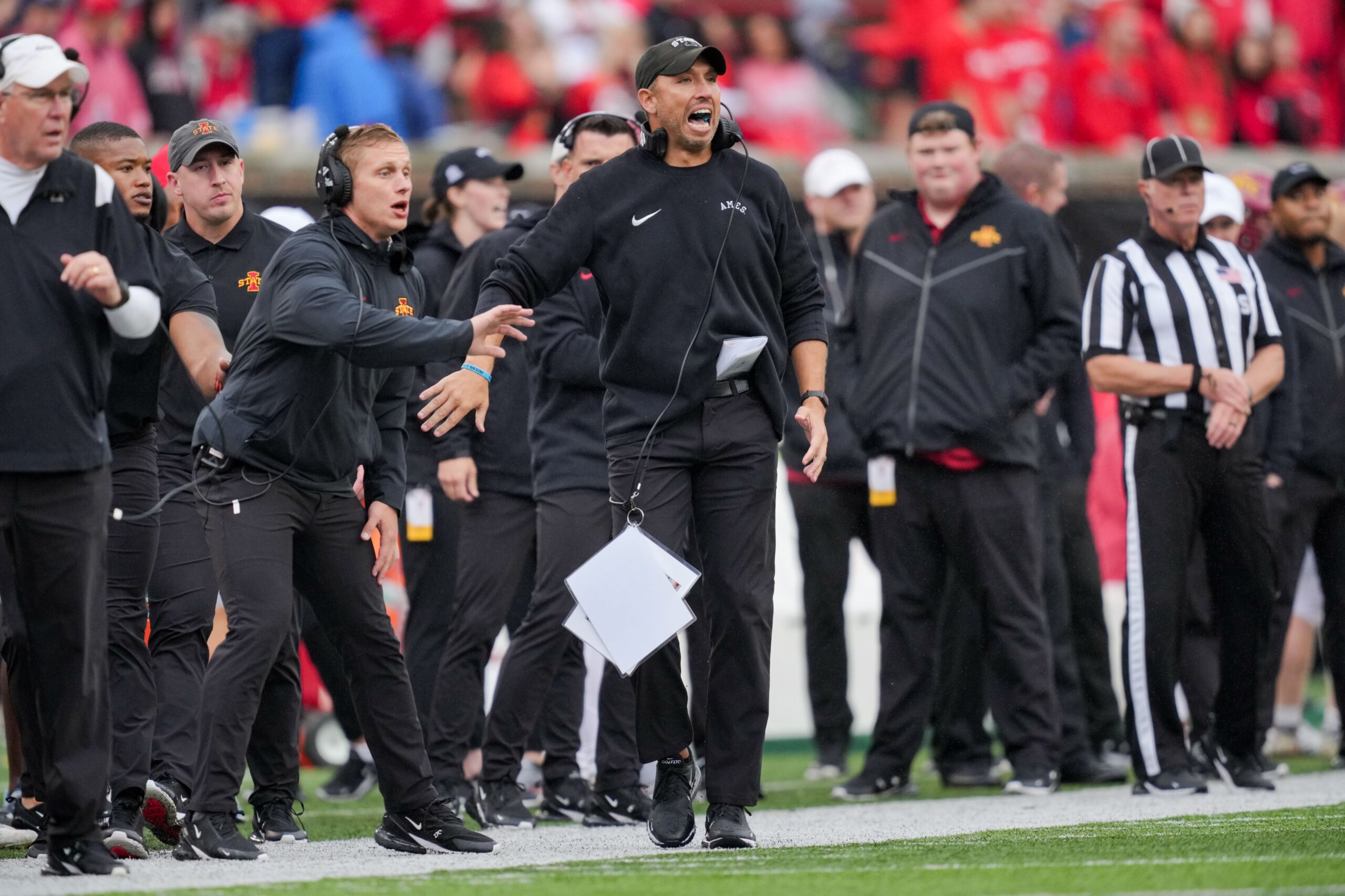 Oct 14, 2023; Cincinnati, Ohio, USA; Iowa State Cyclones head coach Matt Campbell yells on the field during a play against the Cincinnati Bearcats in the second half at Nippert Stadium.