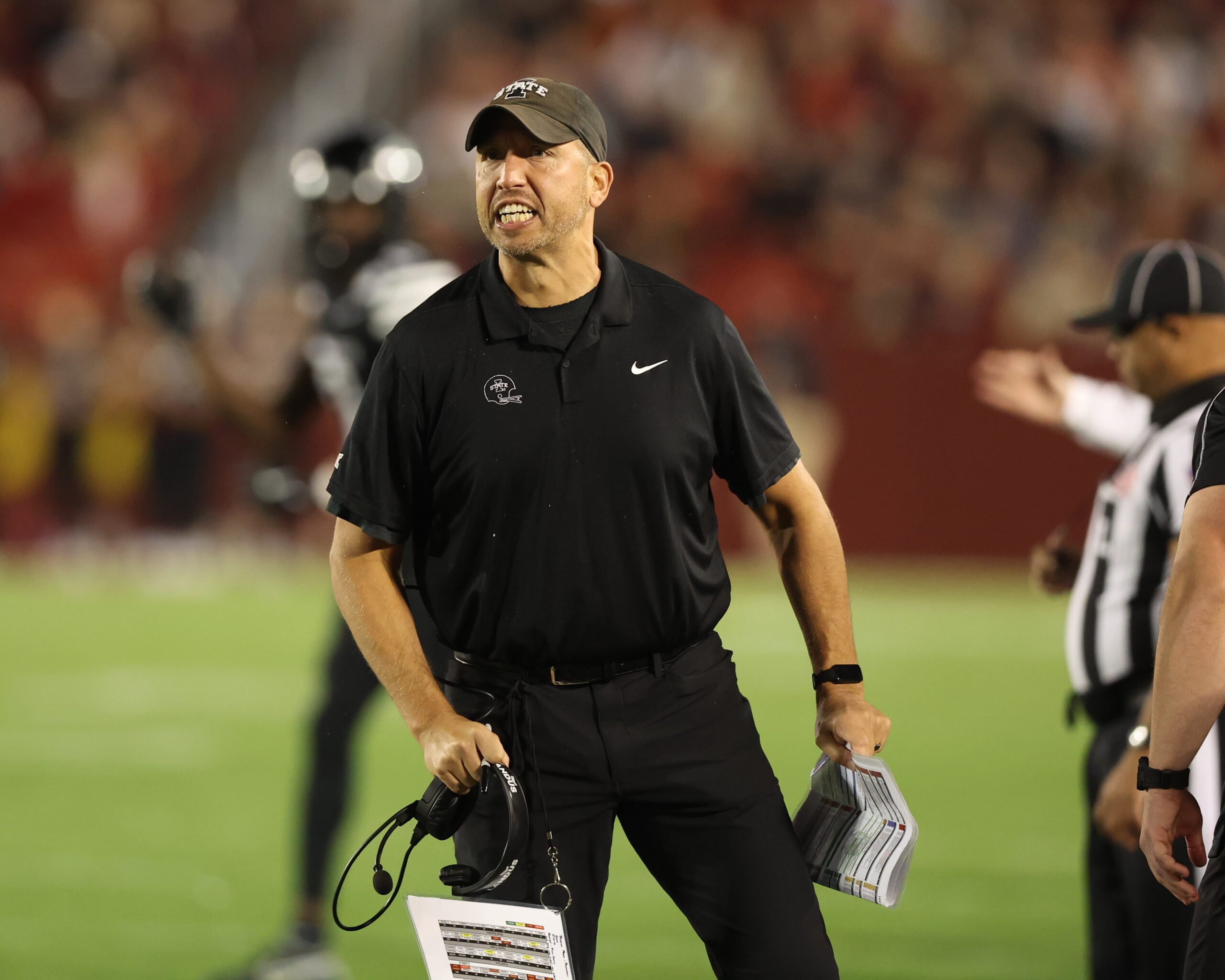 Oct 19, 2024; Ames, Iowa, USA; Iowa State Cyclones head coach Matt Campbell talks to the officials during their game with the UCF Knights at Jack Trice Stadium. The Cyclones beat the Knights 38 to 35.