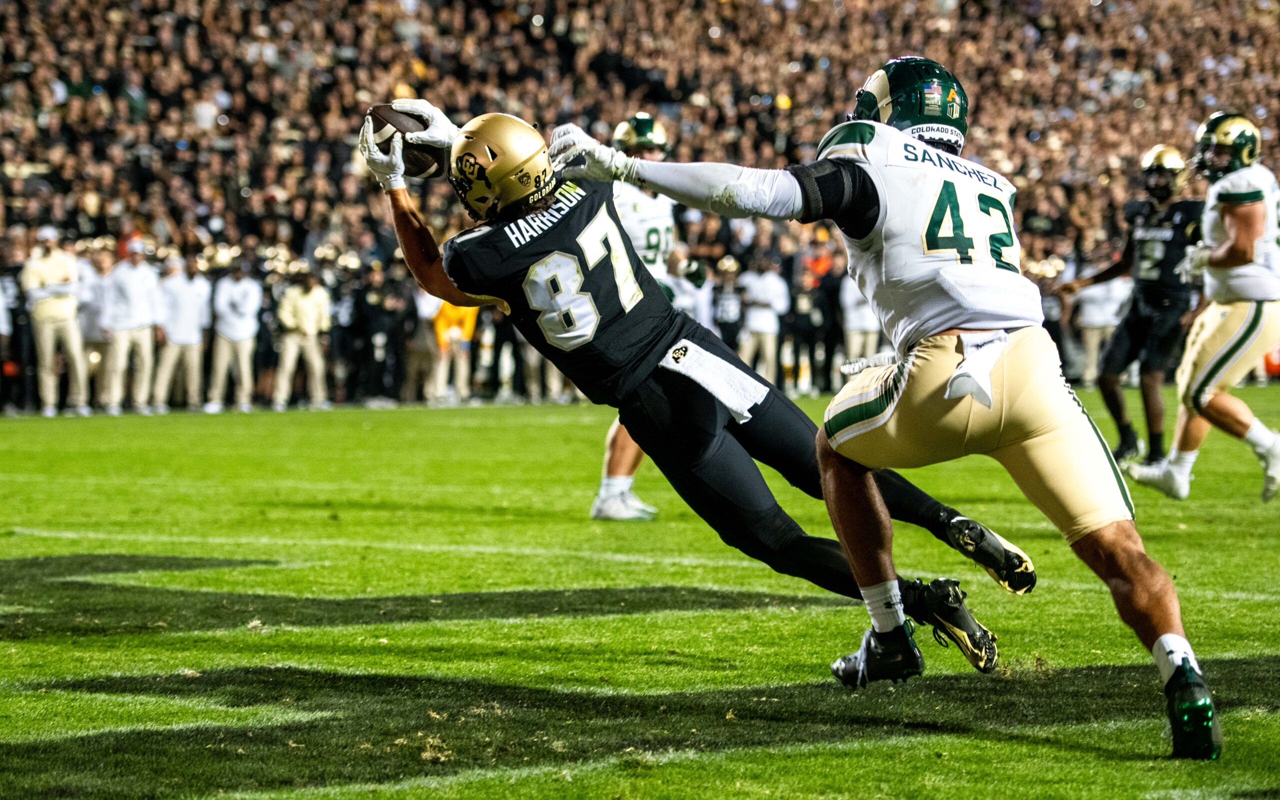 CU football's junior tight end Michael Harrison (87) hauls in a touchdown in overtime against CSU in the Rocky Mountain Showdown on Sept. 16, 2023 at Folsom Field in Boulder, Colo.