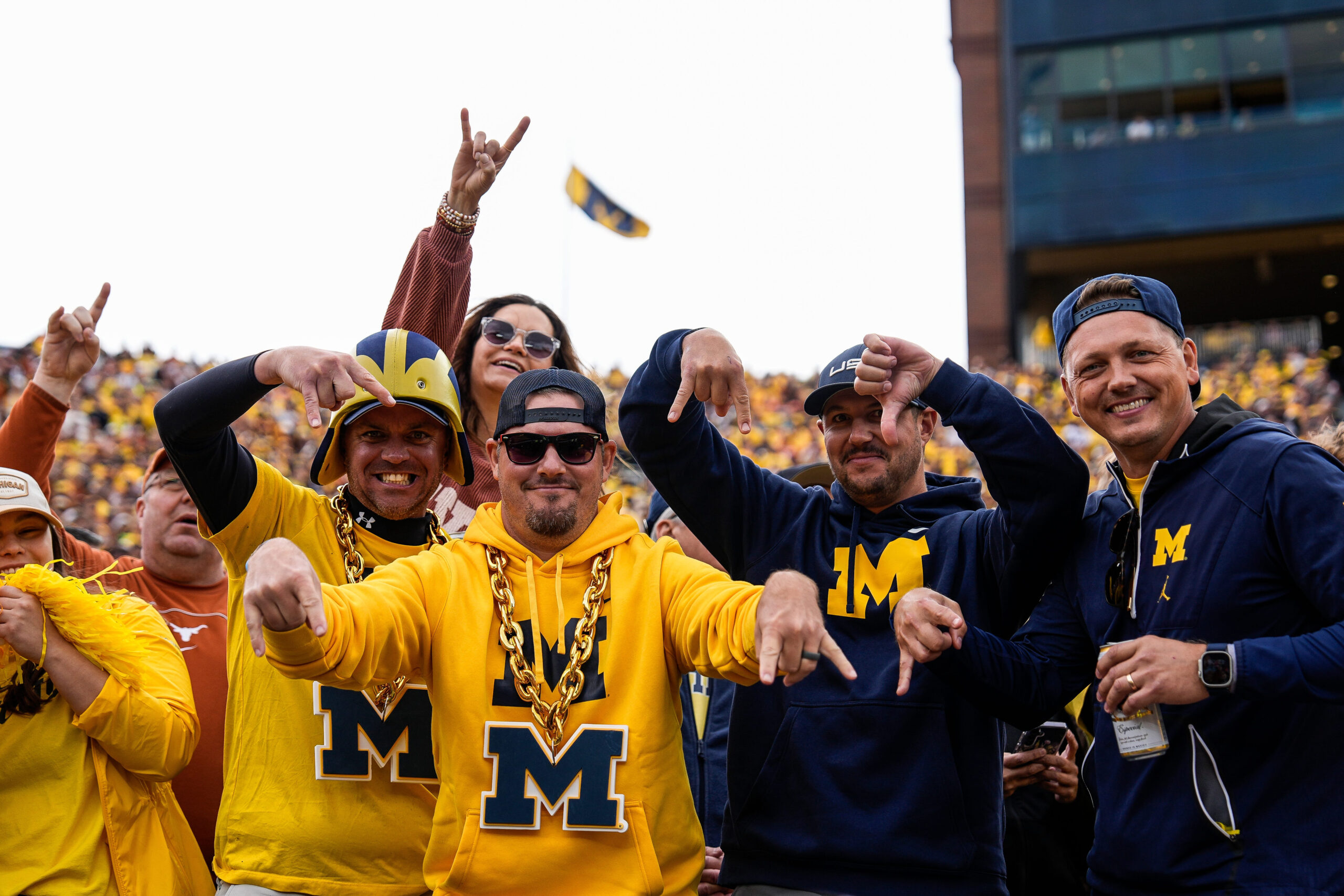 Sep 7, 2024; Ann Arbor, Michigan, USA; Michigan fans cheer at Michigan Stadium. 
