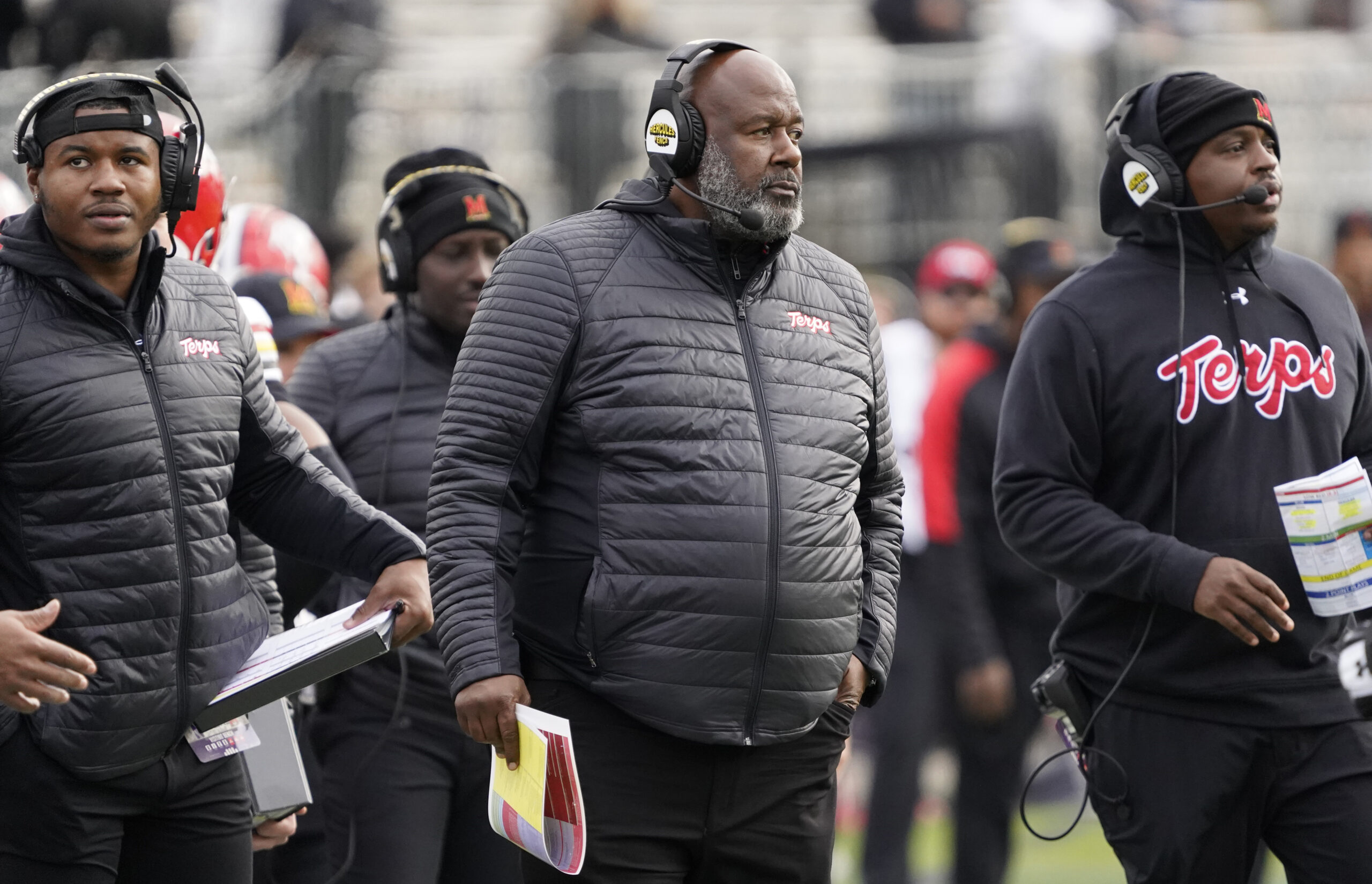 Oct 28, 2023; Evanston, Illinois, USA; Maryland Terrapins head coach Mike Locksley (center) on the sidelines during the second half at Ryan Field. 