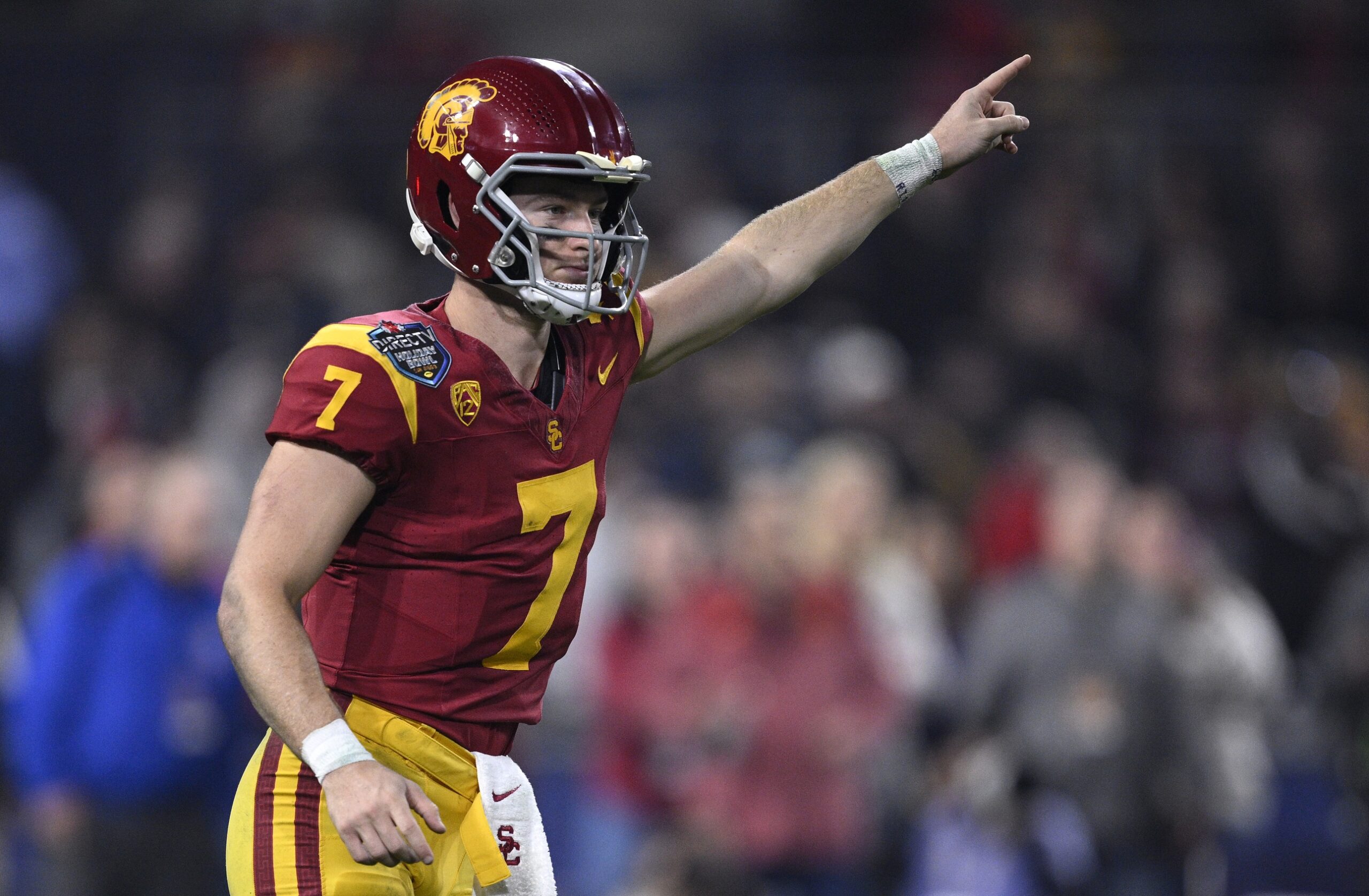 Dec 27, 2023; San Diego, CA, USA; USC Trojans quarterback Miller Moss (7) gestures during a running play against the Louisville Cardinals in the second half at Petco Park.