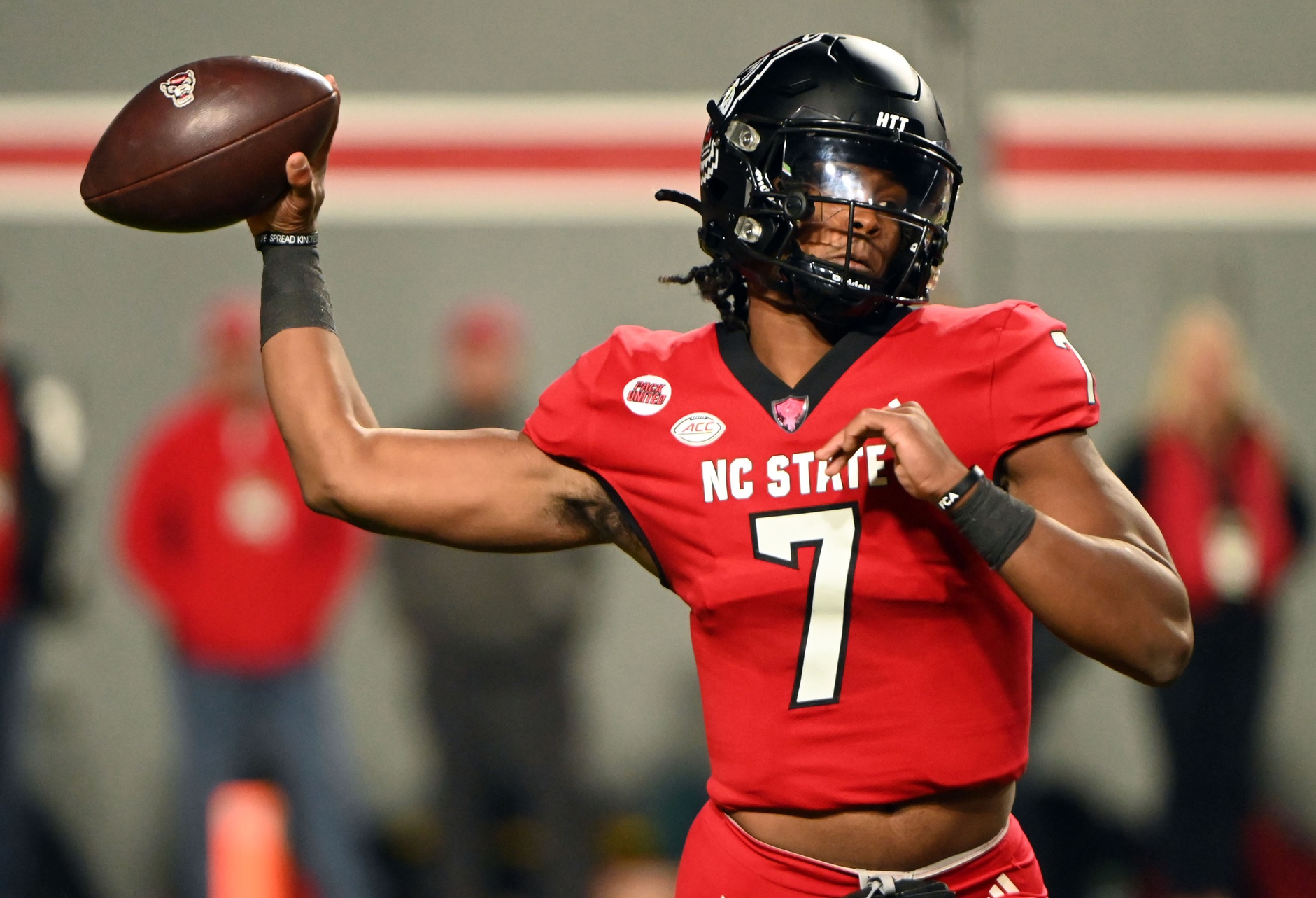 Nov 4, 2023; Raleigh, North Carolina, USA; North Carolina State Wolfpack quarterback MJ Morris (7) throws a pass during the first half against the Miami Hurricanes at Carter-Finley Stadium.