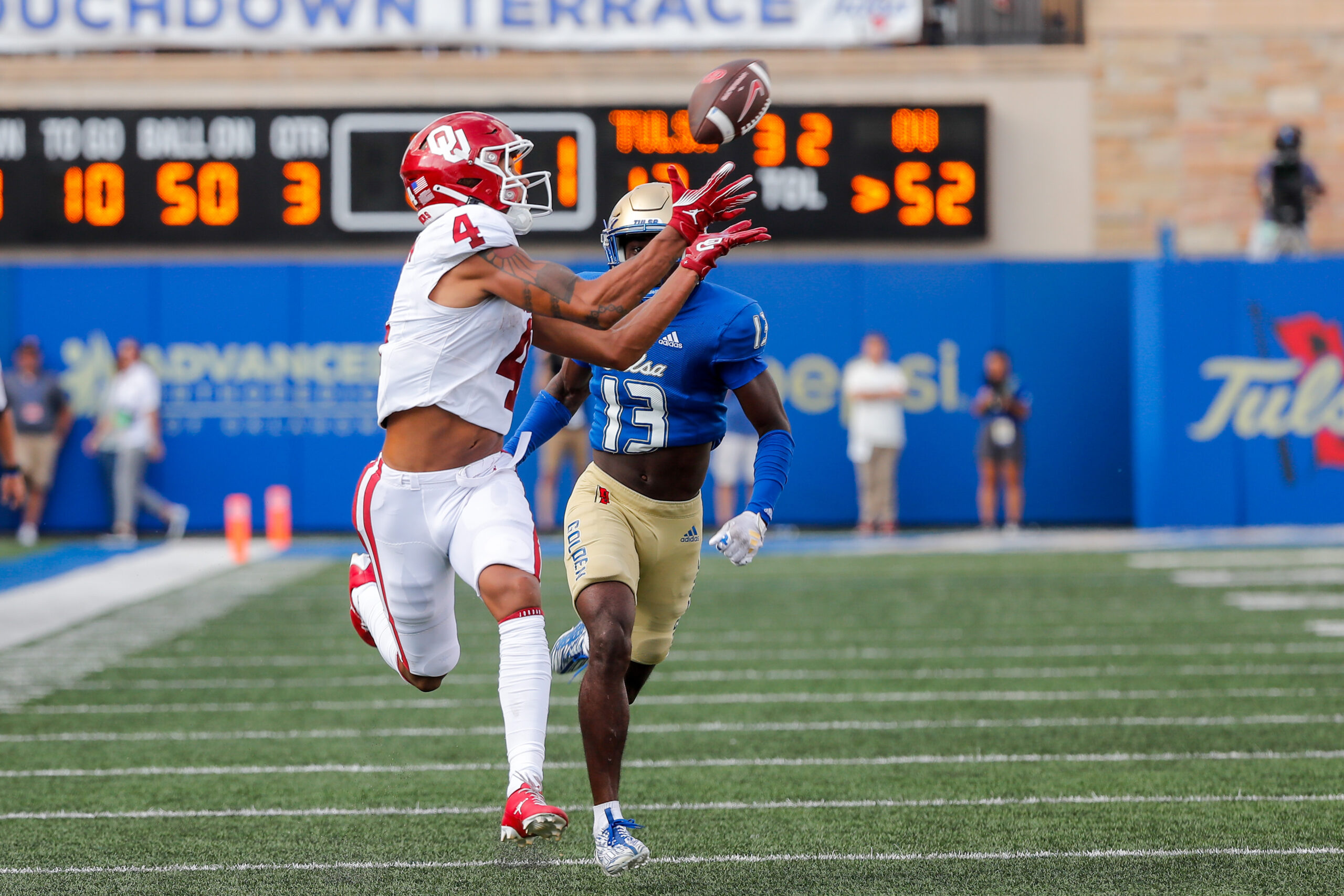 Sep 16, 2023; Tulsa, Oklahoma, USA; Oklahoma's Nic Anderson (4) receives a pass in the third quarter during an NCAA football game between University of Oklahoma (OU) and University of Tulsa at Skelly Field at H.A. Chapman Stadium.