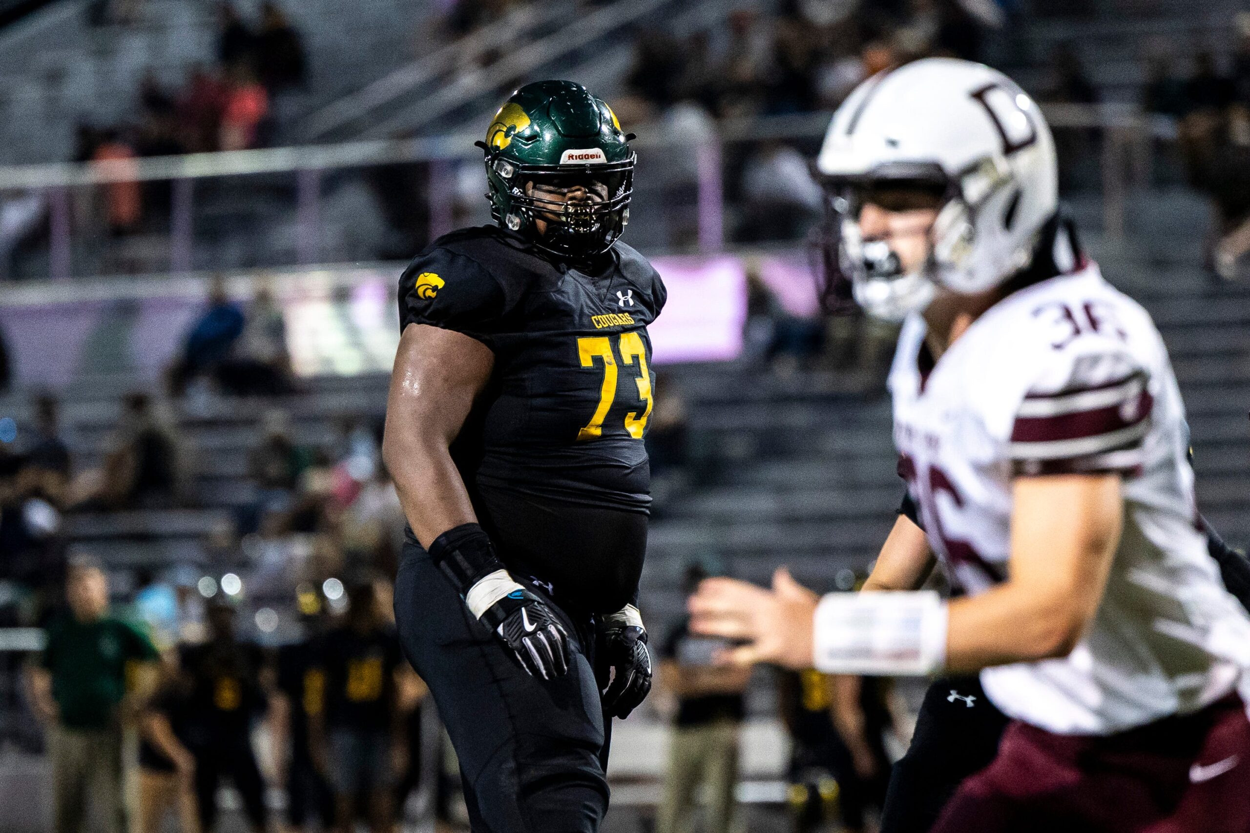Cedar Rapids Kennedy's Nick Brooks (73) get set before a play during a Class 5A high school football game against Dowling Catholic, Saturday, Aug. 26, 2023, at Kingston Stadium in Cedar Rapids, Iowa.