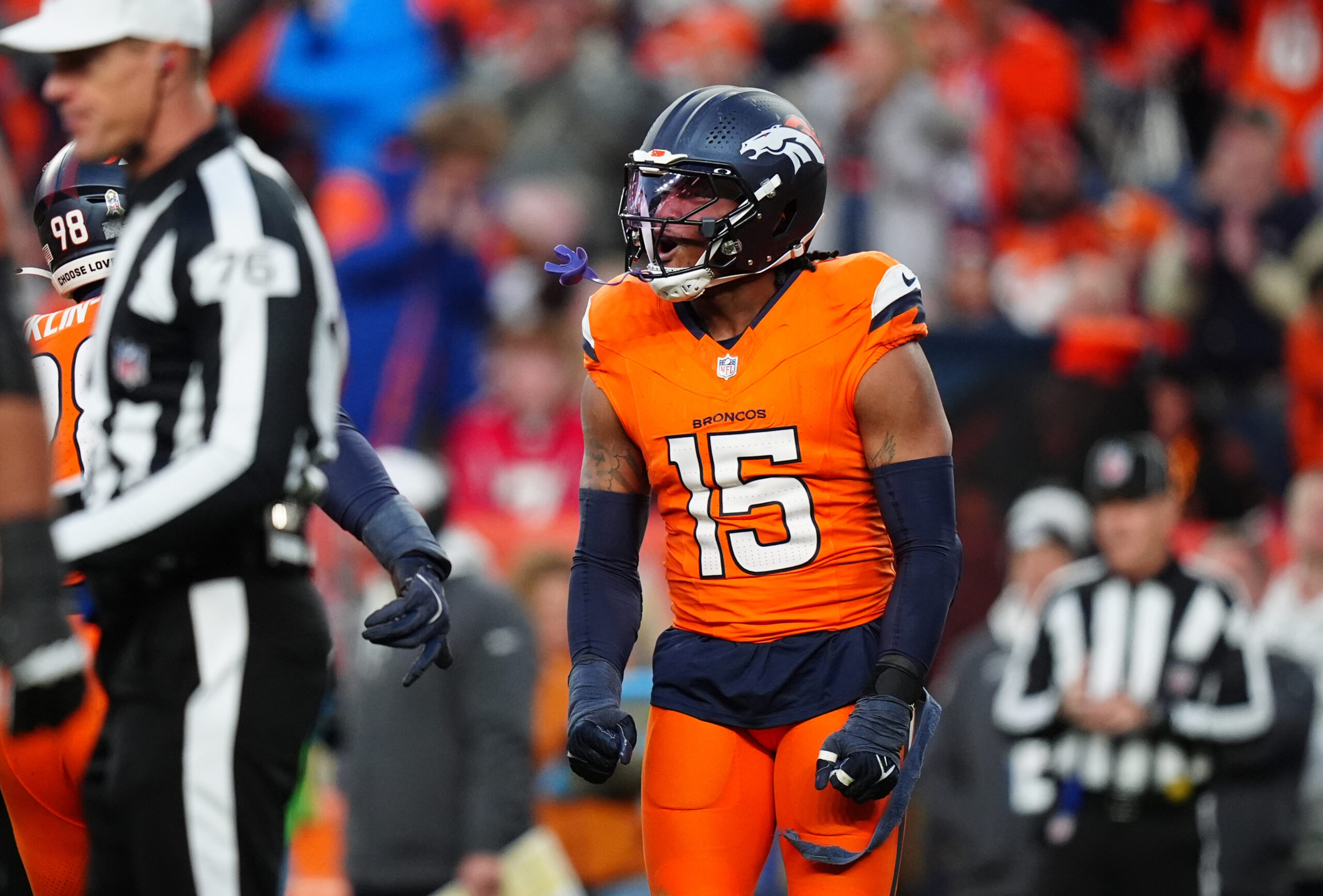 Nov 17, 2024; Denver, Colorado, USA; Denver Broncos linebacker Nik Bonitto (15) celebrates his sack in the second half against the Atlanta Falcons at Empower Field at Mile High.