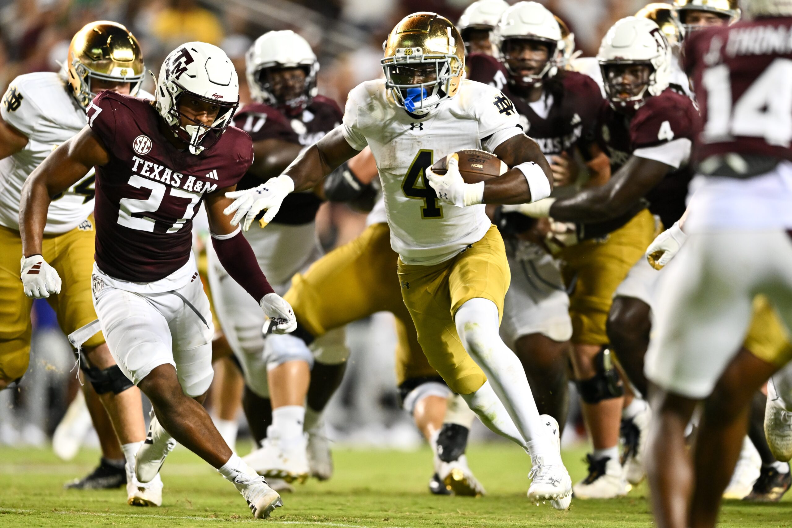 Aug 31, 2024; College Station, Texas, USA; Notre Dame Fighting Irish running back Jeremiyah Love (4) runs the ball for a touchdown in the fourth quarter against the Texas A&M Aggies at Kyle Field.