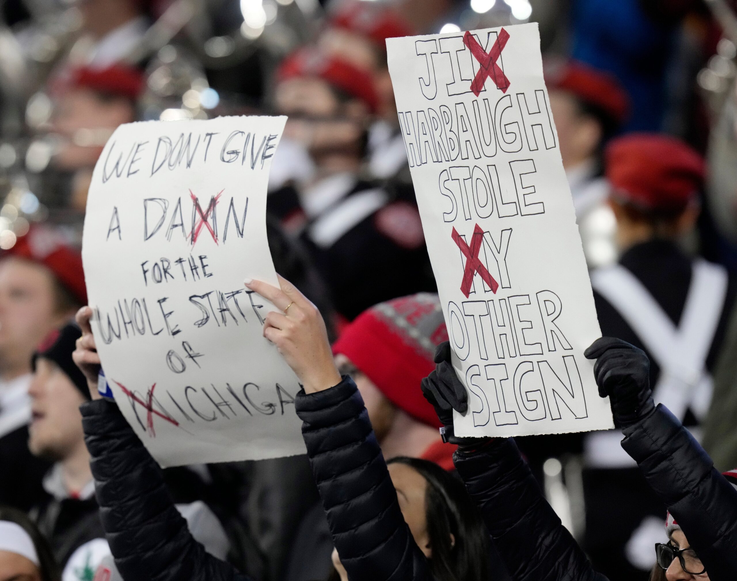 Nov. 11, 2023; Columbus, Oh., USA; Ohio State fans hold signs in the south stands during the second half of Saturday's NCAA Division I football game against the Michigan State Spartans at Ohio Stadium.