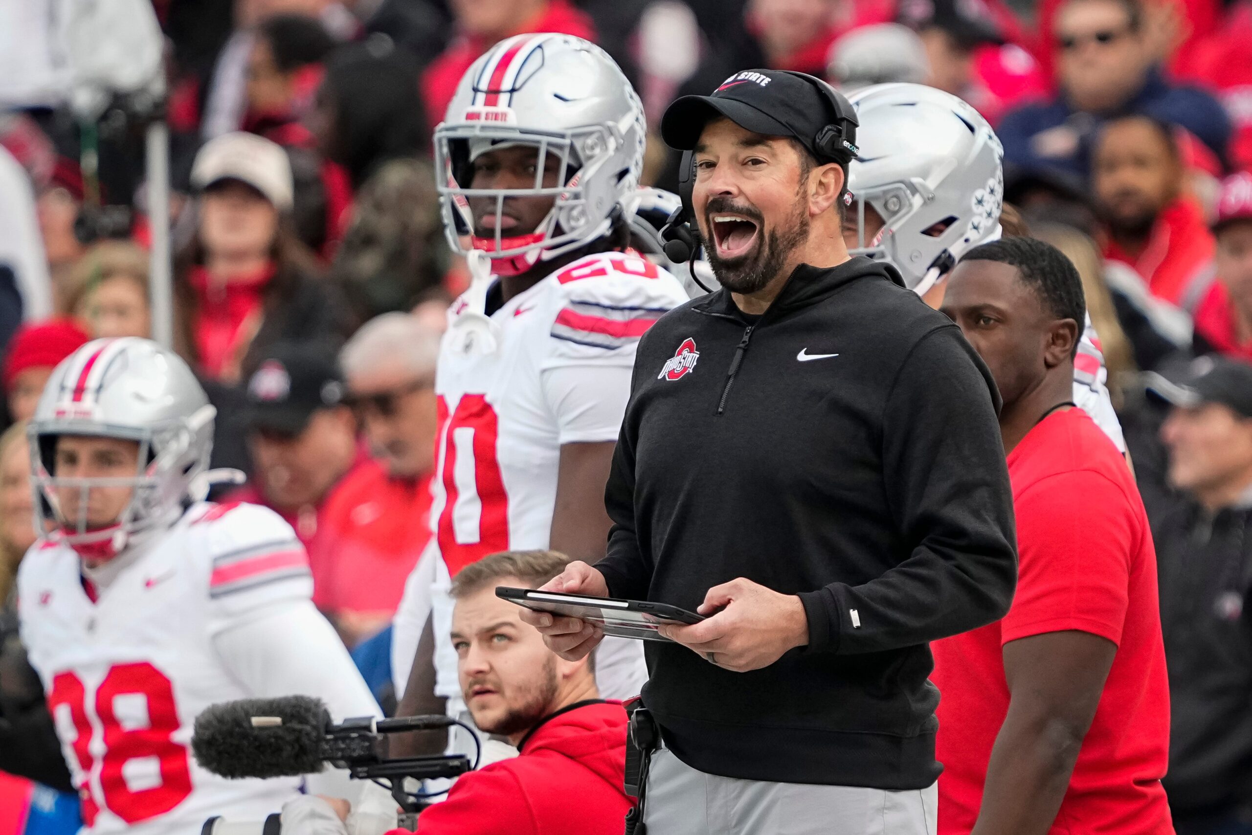 Ohio State Buckeyes head coach Ryan Day yells from the sideline during the NCAA football game against the Northwestern Wildcats at Wrigley Field in Chicago on Monday, Nov. 18, 2024. Ohio State won 31-7.