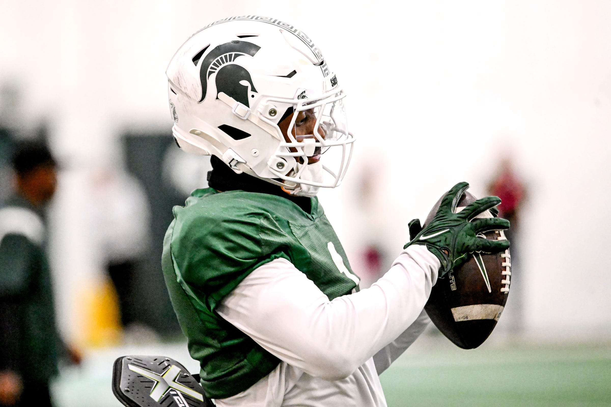 Michigan State's receiver Omari Kelly catches a pass during football practice on Tuesday, April 8, 2025, in East Lansing.