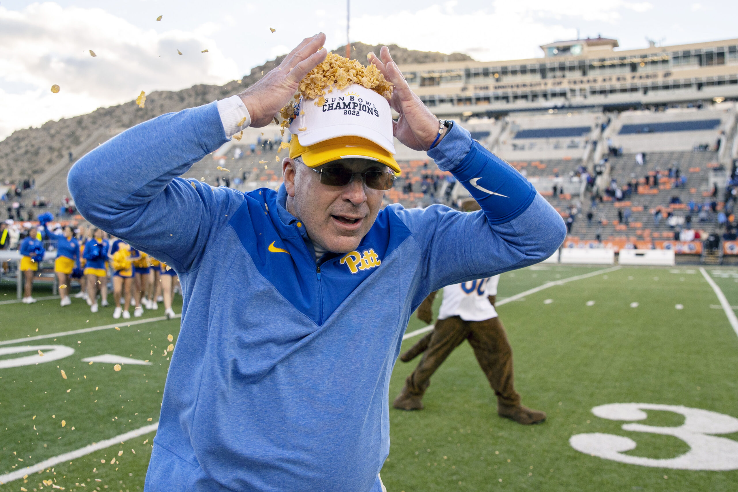 Dec 30, 2022; El Paso, Texas, USA; Pittsburgh Panthers head football coach Pat Narduzzi throws Frosted Flakes on himself after defeating the UCLA Bruins 37-35 in the 2022 Sun Bowl at Sun Bowl.