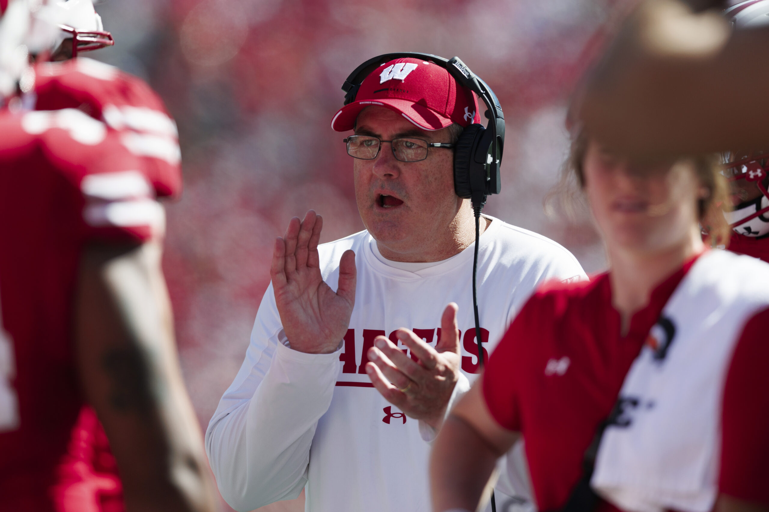 Oct 1, 2022; Madison, Wisconsin, USA; Wisconsin Badgers head coach Paul Chryst encourages his team during the third quarter against the Illinois Fighting Illini at Camp Randall Stadium.