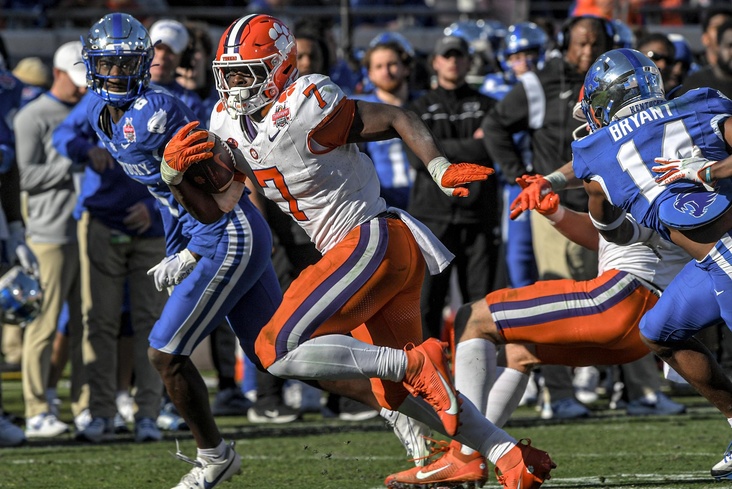 Clemson running back Phil Mafah (7) runs for the third of his four touchdowns against Kentucky during the fourth quarter of the TaxSlayer Gator Bowl at EverBank Stadium in Jacksonville, Florida, Friday, December 29, 2023. Clemson won 38-35.
