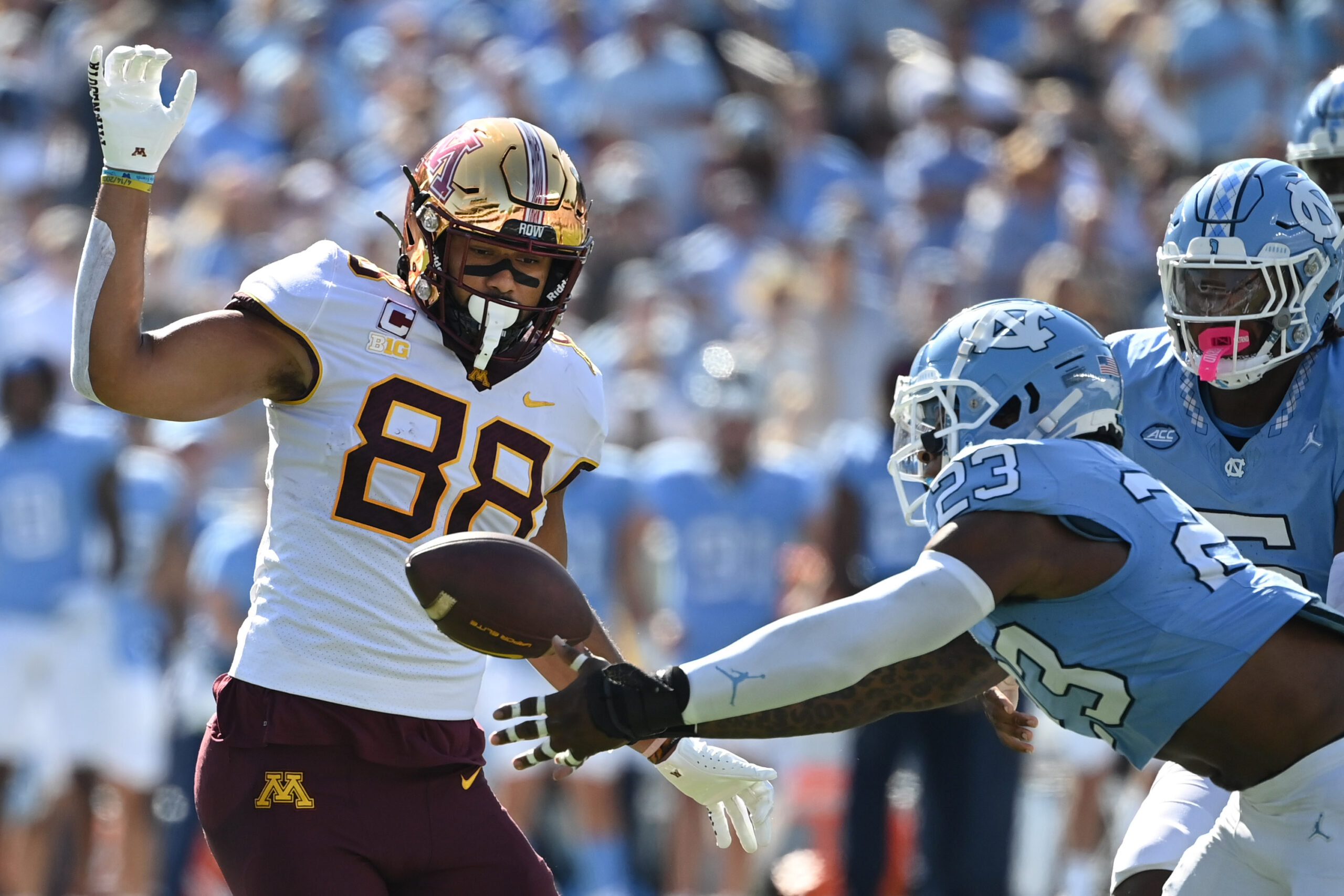 Sep 16, 2023; Chapel Hill, North Carolina, USA; North Carolina Tar Heels linebacker Power Echols (23) intercepts the ball as Minnesota Golden Gophers tight end Brevyn Spann-Ford (88) is in the background in the first quarter at Kenan Memorial Stadium.