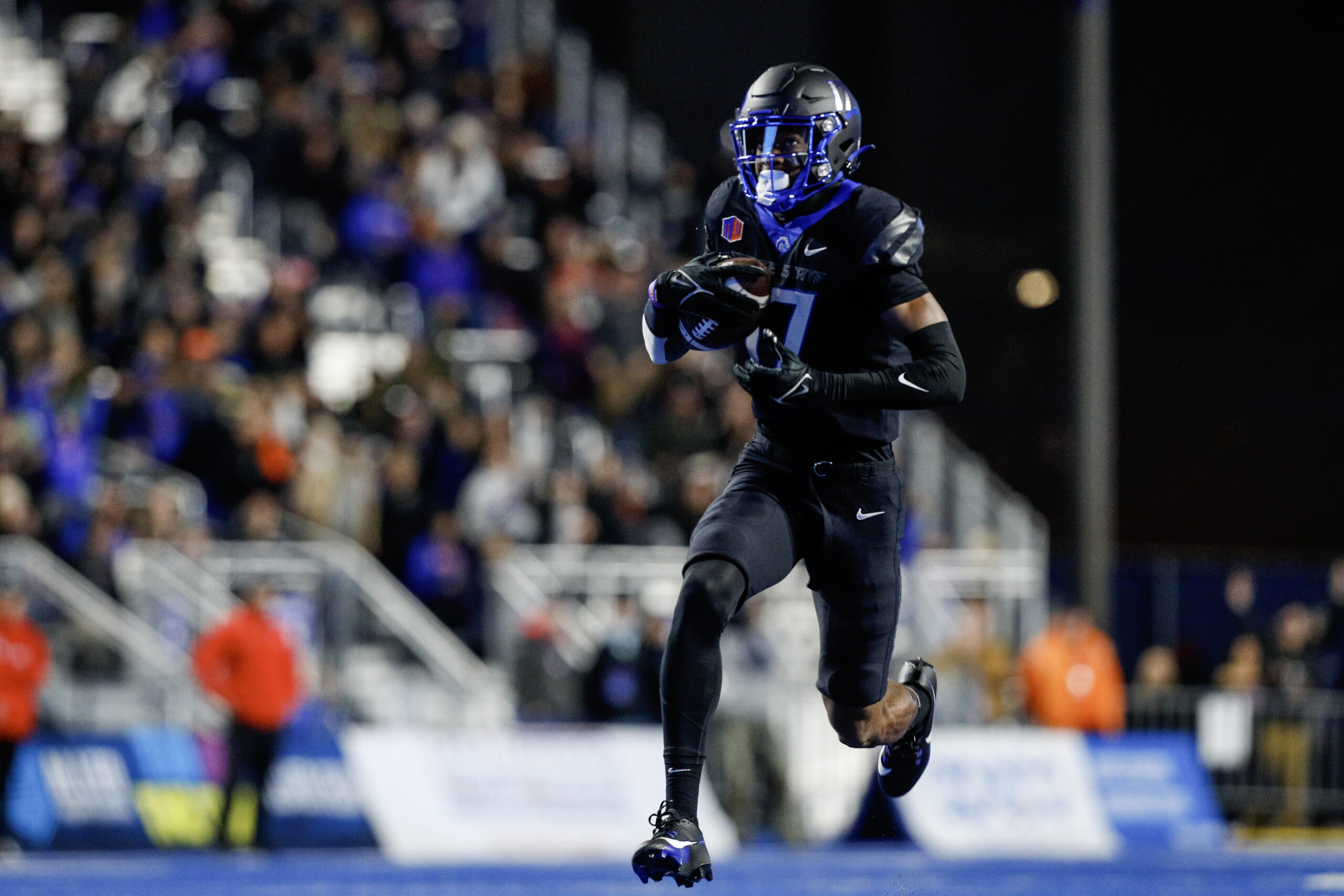 Nov 11, 2023; Boise, Idaho, USA; Boise State Broncos wide receiver Prince Strachan (17) runs to the end zone during the first half against the New Mexico Lobos at Albertsons Stadium.
