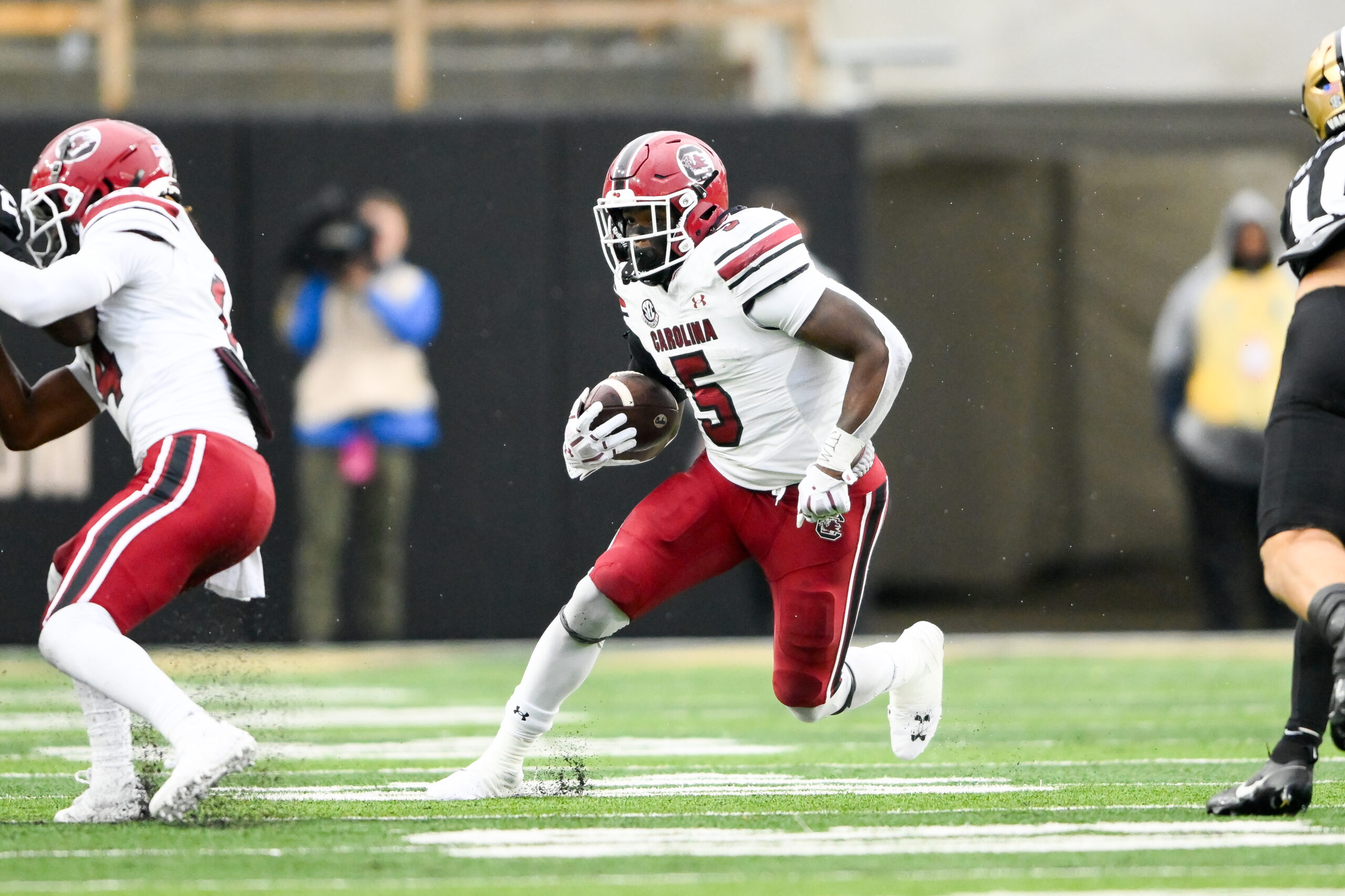 Aug 31, 2024; Columbia, South Carolina, USA; South Carolina Gamecocks running back Raheim Sanders (5) rushes against the Old Dominion Monarchs in the second half at Williams-Brice Stadium.