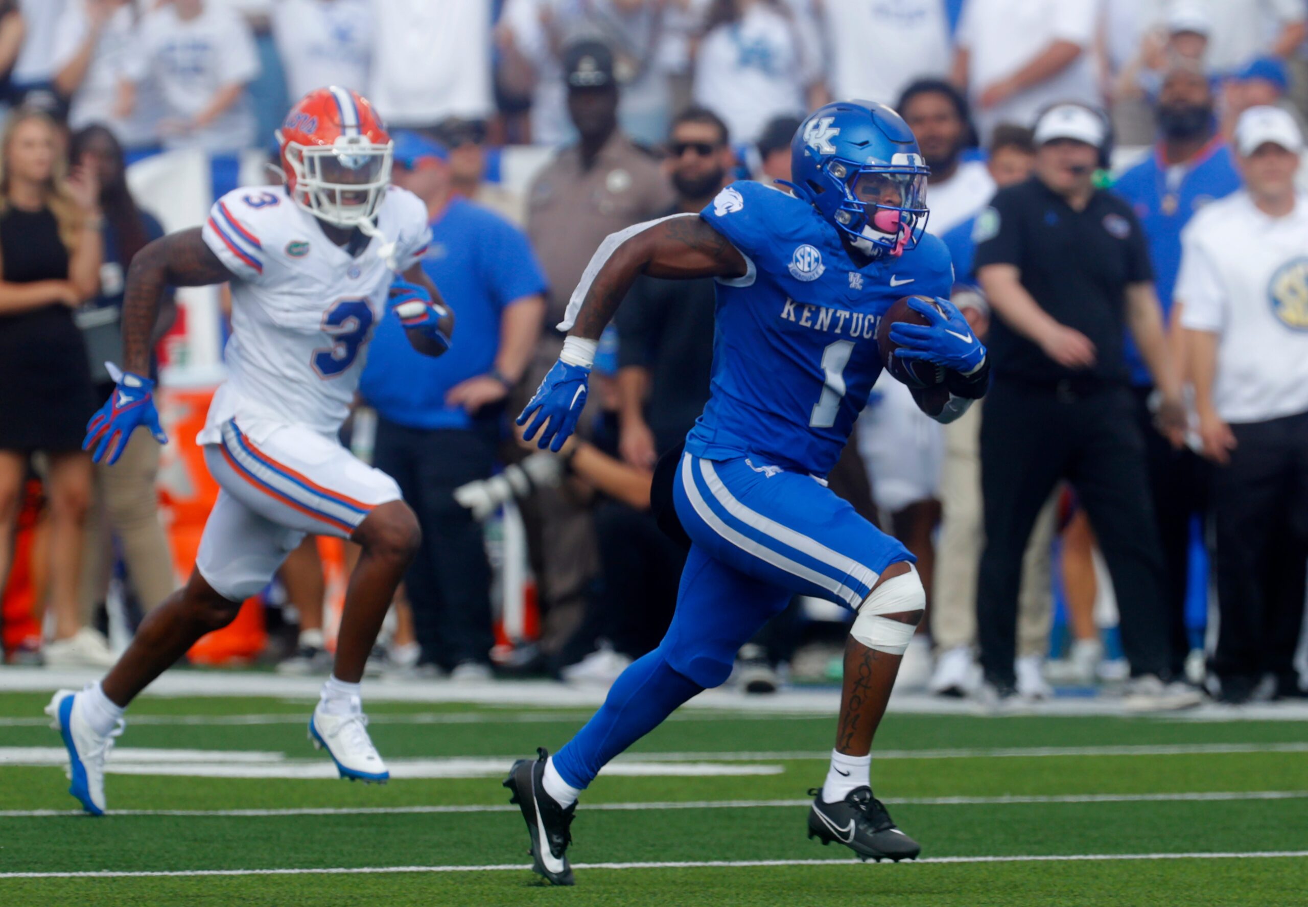 Kentucky's Ray Davis ran past Florida's Jason Marshall Jr. for the long touchdown Saturday afternoon. Sept. 30, 2023
