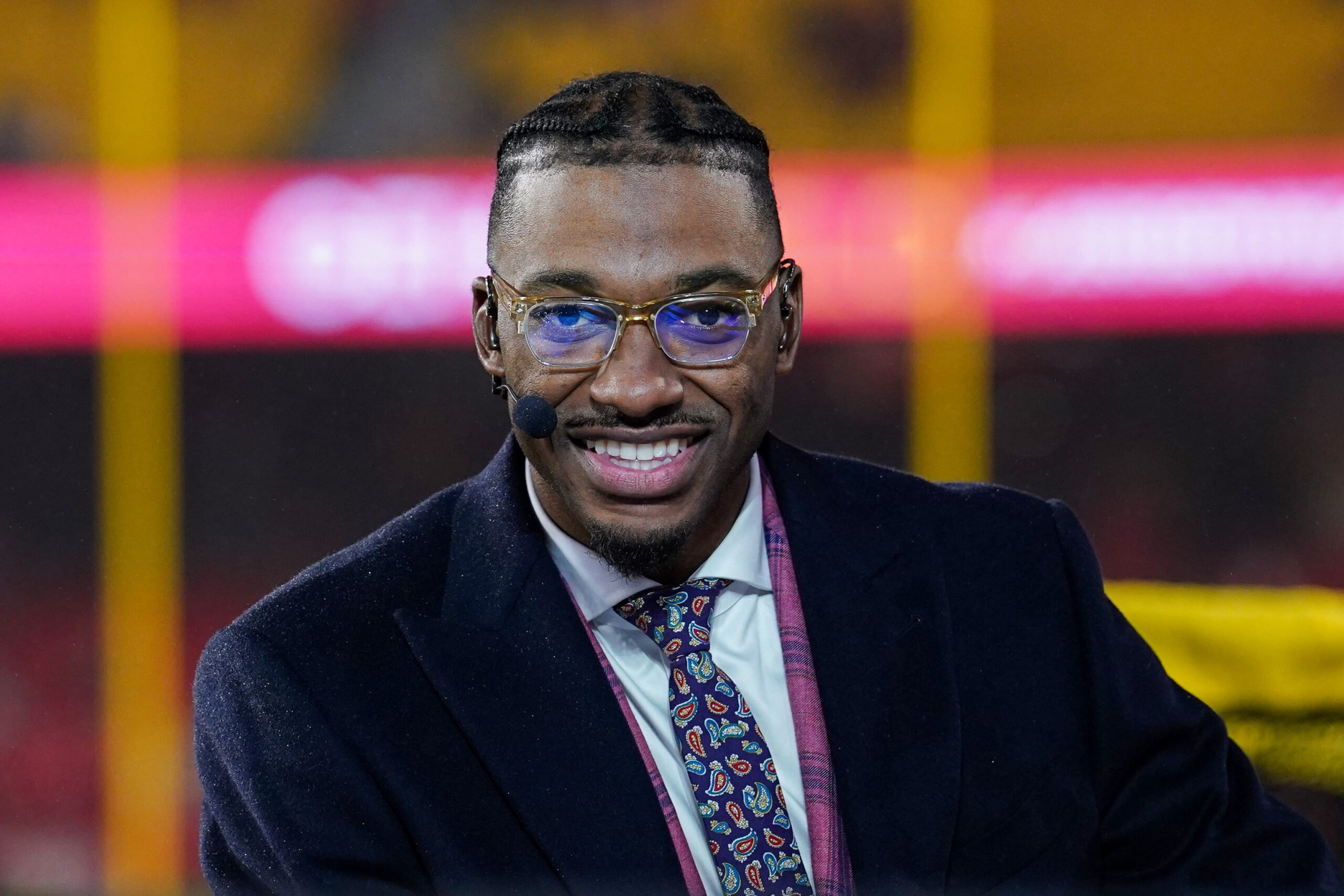 Nov 20, 2023; Kansas City, Missouri, USA; Monday Night Football commentator Robert Griffin III at the broadcast desk prior to a game between the Kansas City Chiefs and Philadelphia Eagles at GEHA Field at Arrowhead Stadium.