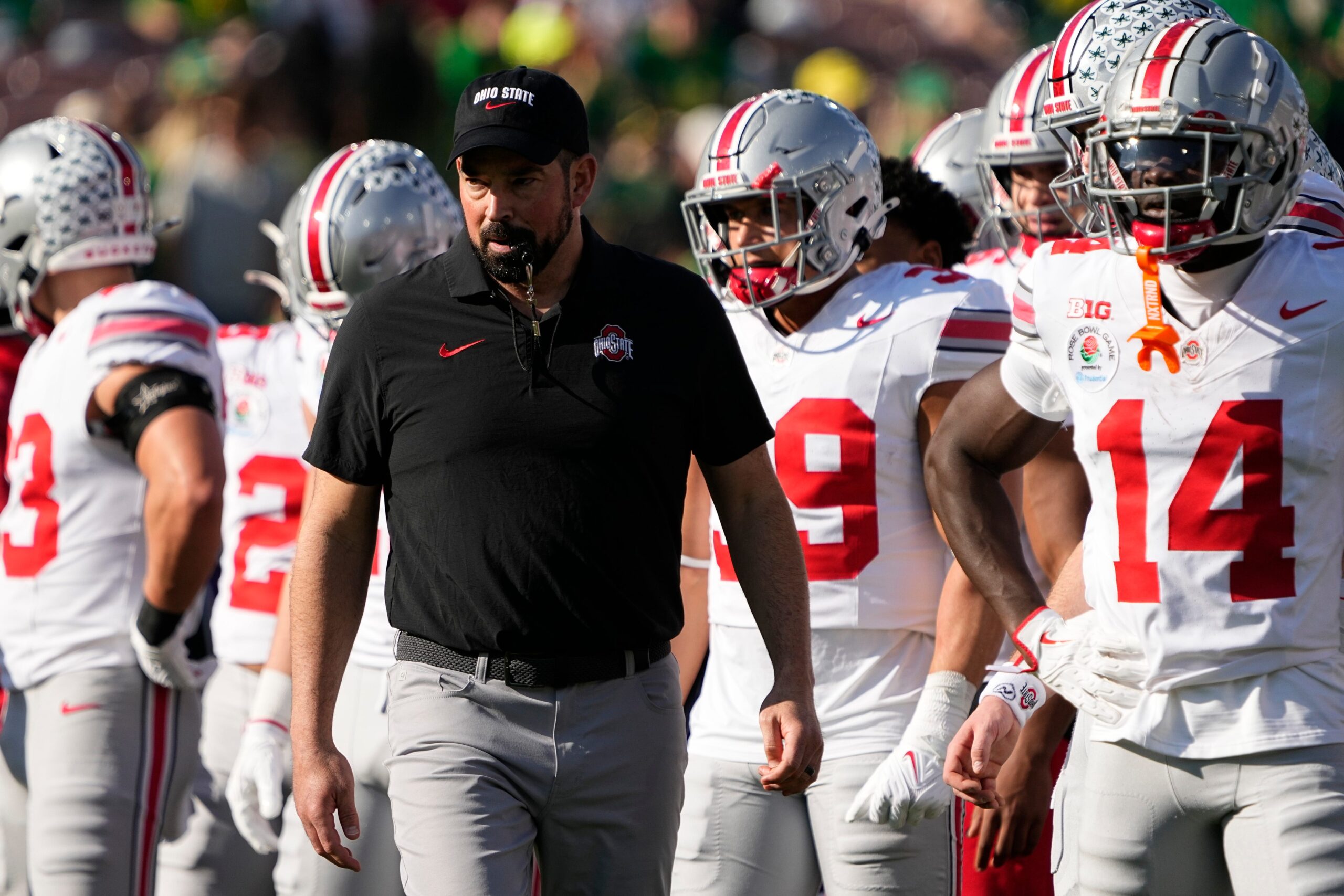 Ohio State Buckeyes head coach Ryan Day leads warm ups prior to the College Football Playoff quarterfinal against the Oregon Ducks at the Rose Bowl in Pasadena, Calif. on Jan. 1, 2025.