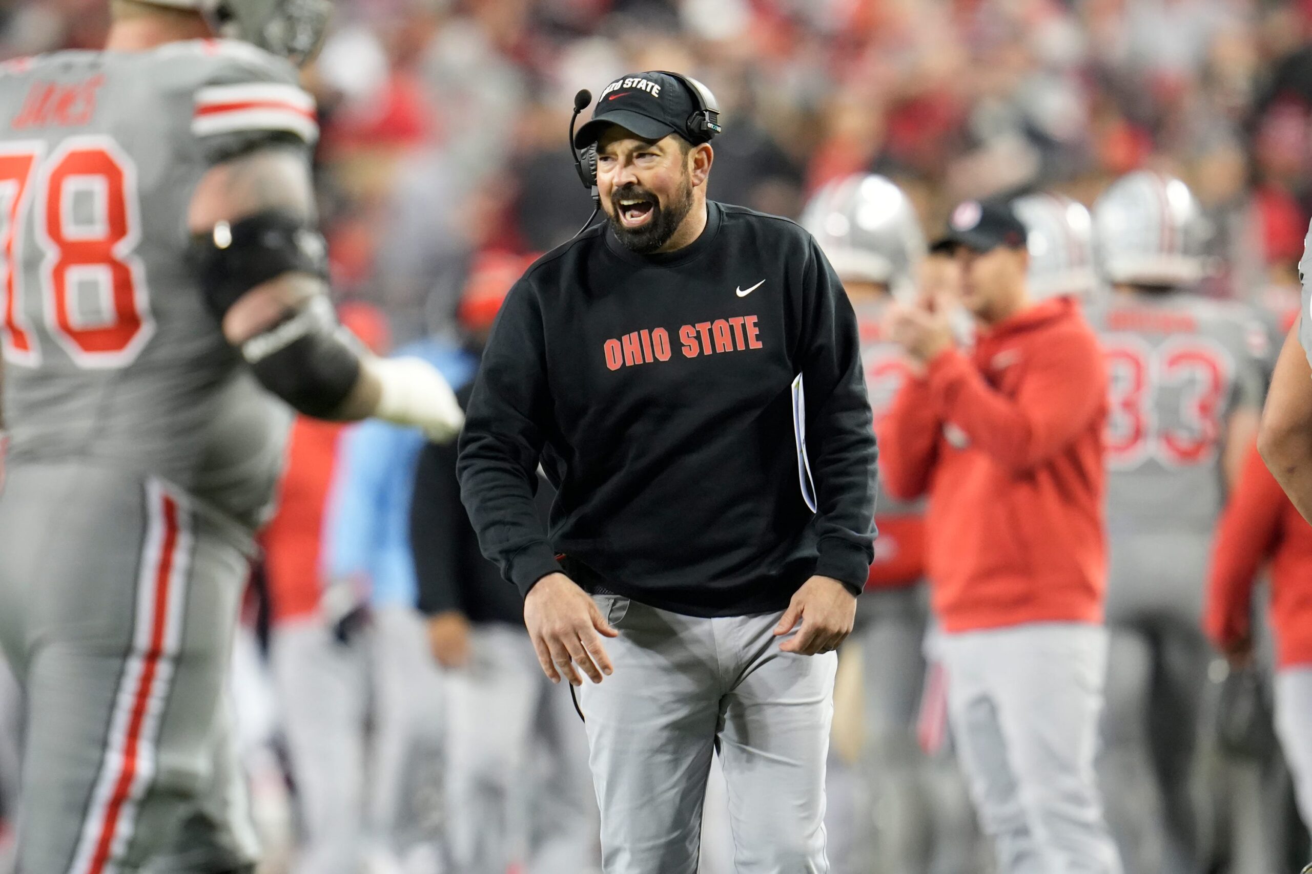 Nov 11, 2023; Columbus, Ohio, USA; Ohio State head coach Ryan Day shouts to the team during the NCAA football game against Michigan State University at Ohio Stadium.