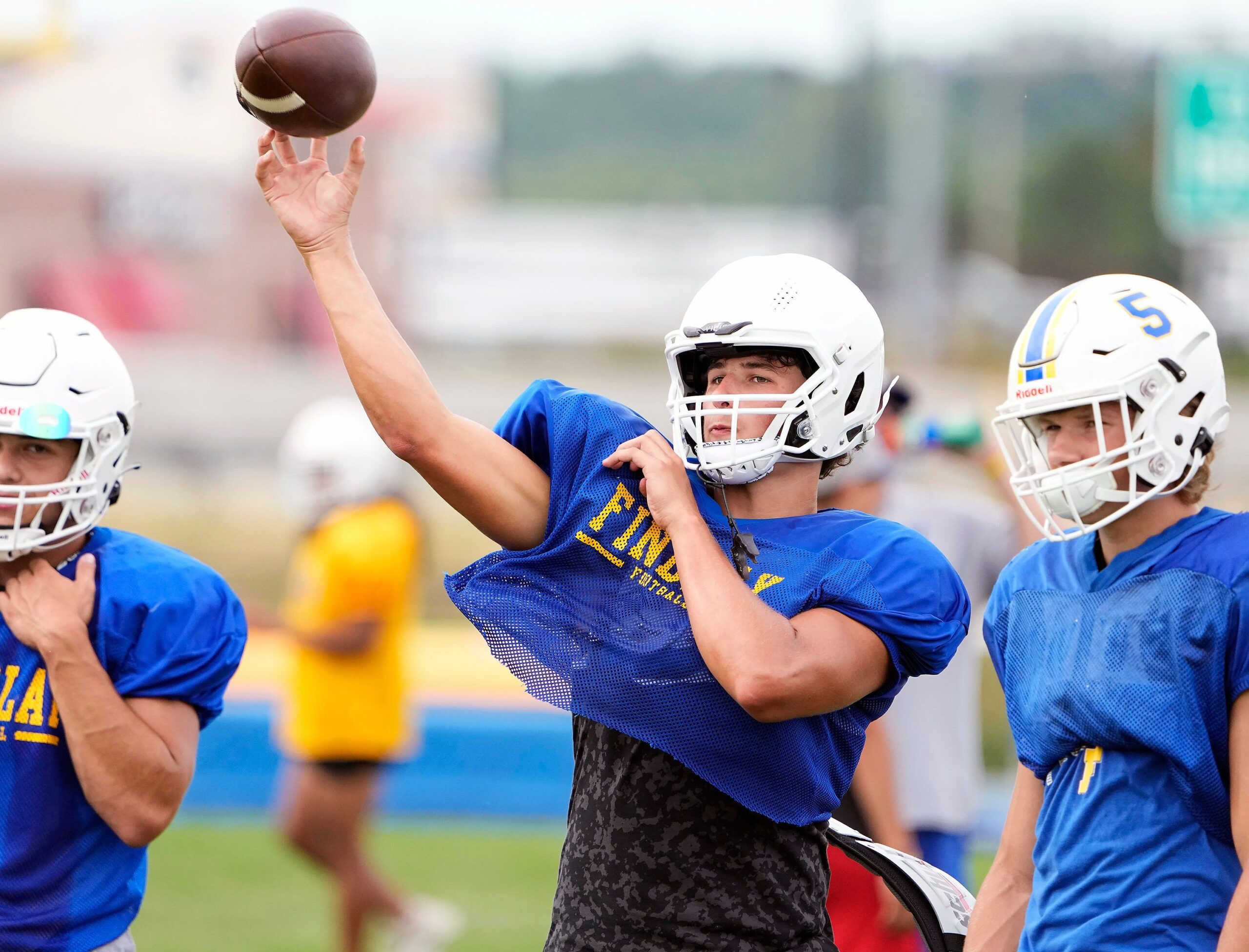 Aug 4, 2022; Findlay, OH, USA; Findlay quarterback Ryan Montgomery looks to throw the ball during practice at Findlay High School on August 4, 2022.
