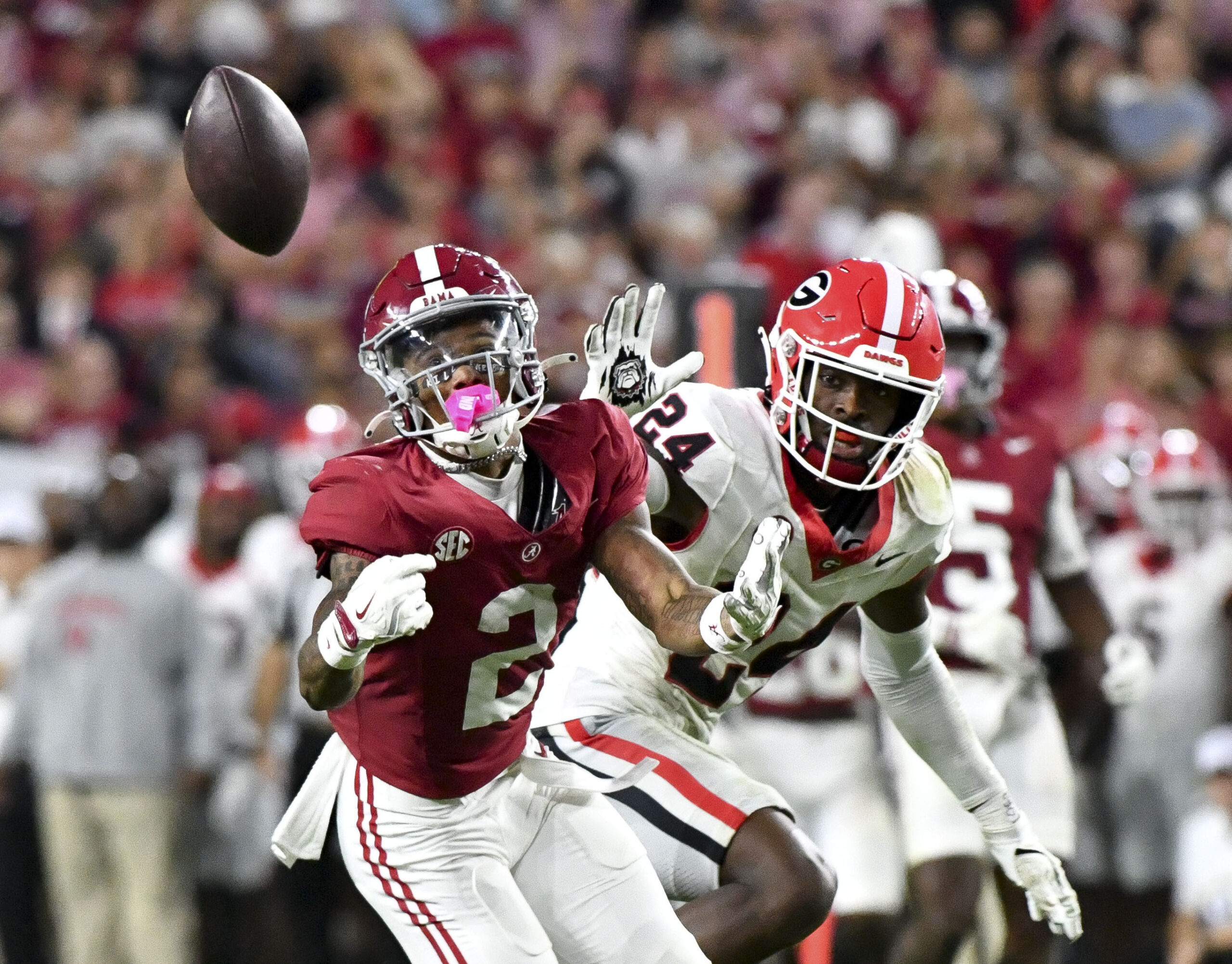 Sep 28, 2024; Tuscaloosa, Alabama, USA; Alabama Crimson Tide wide receiver Ryan Williams (2) makes a catch against Georgia Bulldogs defensive back Malaki Starks (24) at Bryant-Denny Stadium. Alabama defeated Georgia 41-34.