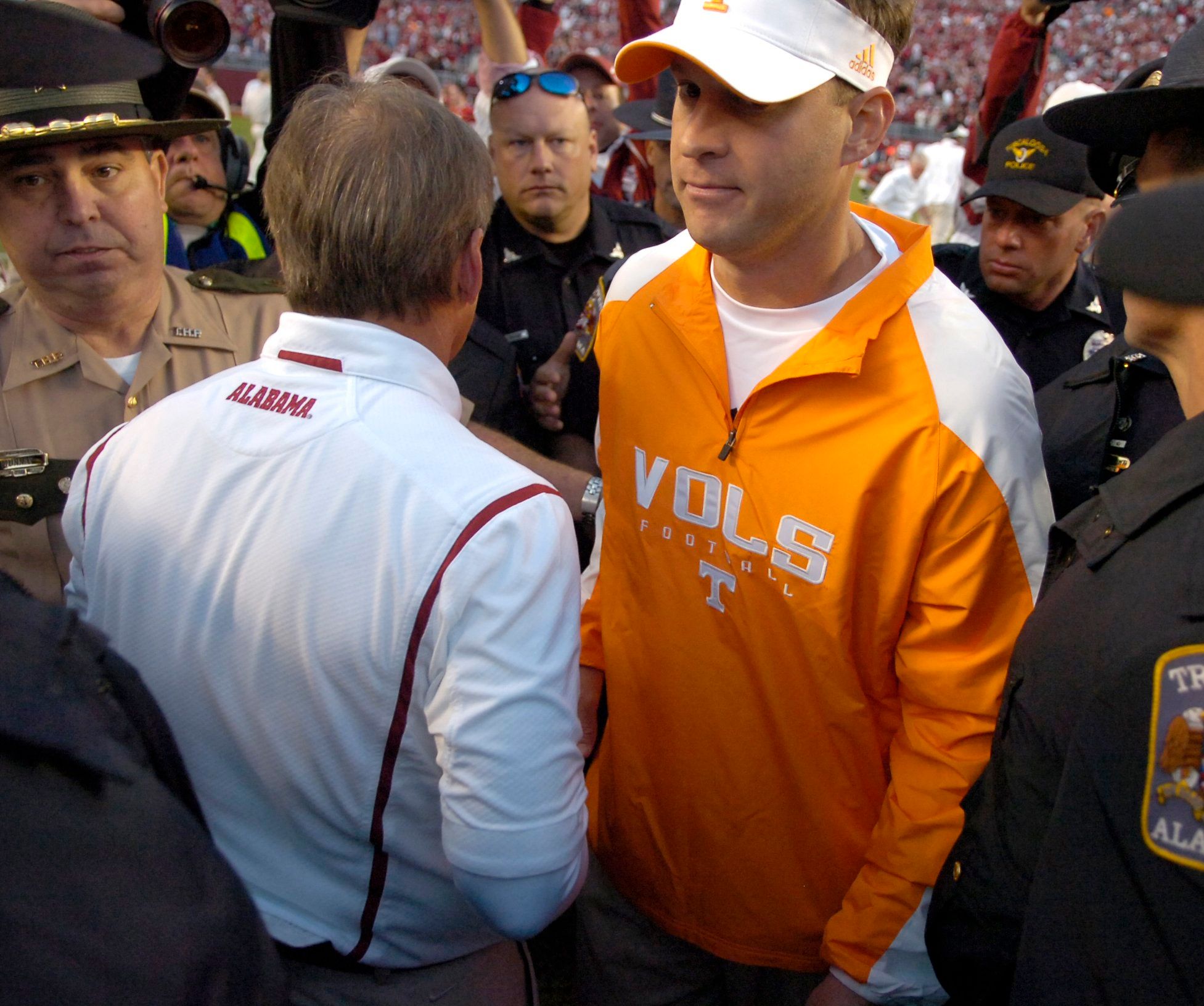 Tennessee head coach Lane Kiffin leaves the field after shaking hands with Alabama head coach Nick Saban at Bryant Denny Stadium in Tuscaloosa on Saturday, Oct. 24, 2009.