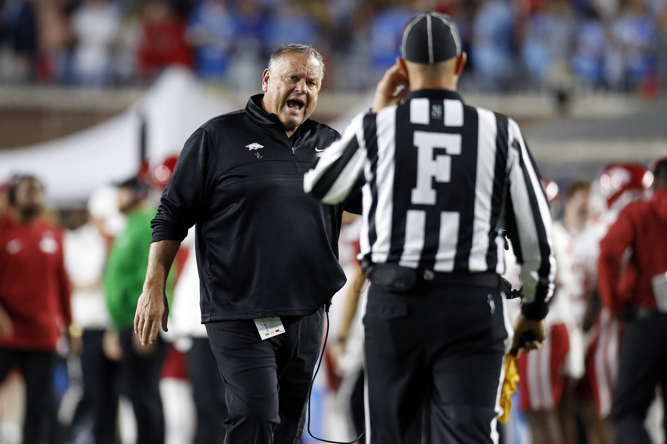 Oct 7, 2023; Oxford, Mississippi, USA; Arkansas Razorbacks head coach Sam Pittman reacts to a referee after a penalty during the first half against the Mississippi Rebels at Vaught-Hemingway Stadium.