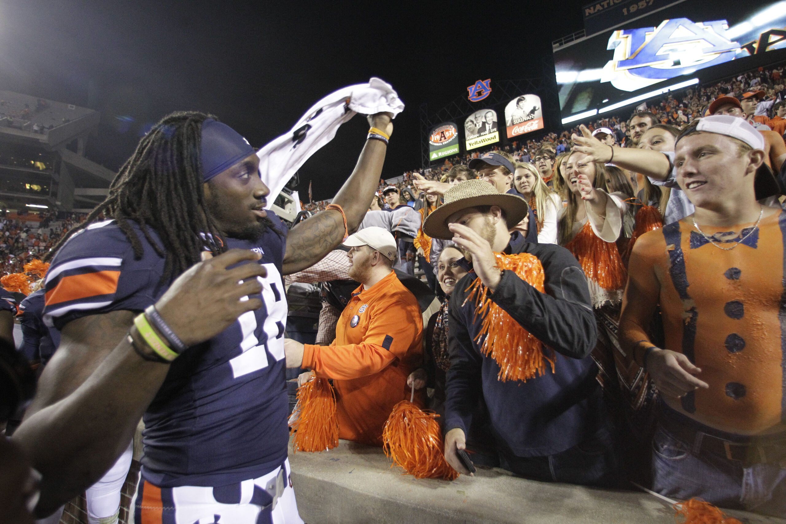Oct 4, 2014; Auburn, AL, USA; Auburn Tigers receiver Sammie Coates (18) celebrates with fans after defeating the LSU Tigers at Jordan Hare Stadium. Auburn beat LSU 41-7.