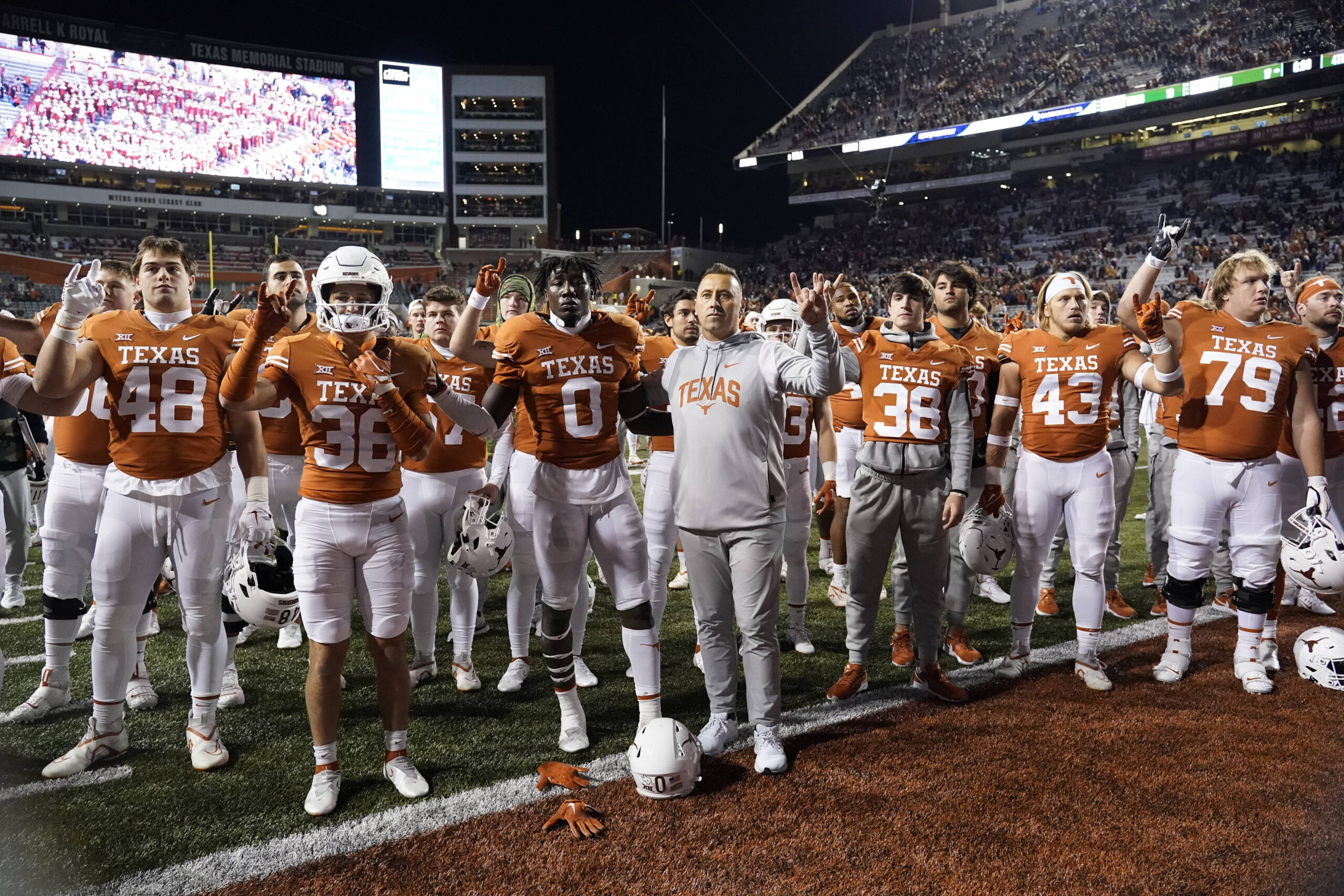 Nov 12, 2022; Austin, Texas, USA; Texas Longhorns head coach Steve Sarkisian and players stand with fans for The Eyes of Texas after a loss against the Texas Christian Horned Frogs at Darrell K Royal-Texas Memorial Stadium.