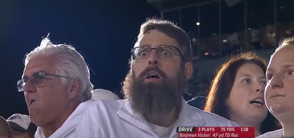 Penn State fan looks in shock after a Binjimen Victor touchdown to close the gap in the 2018 Ohio State game.