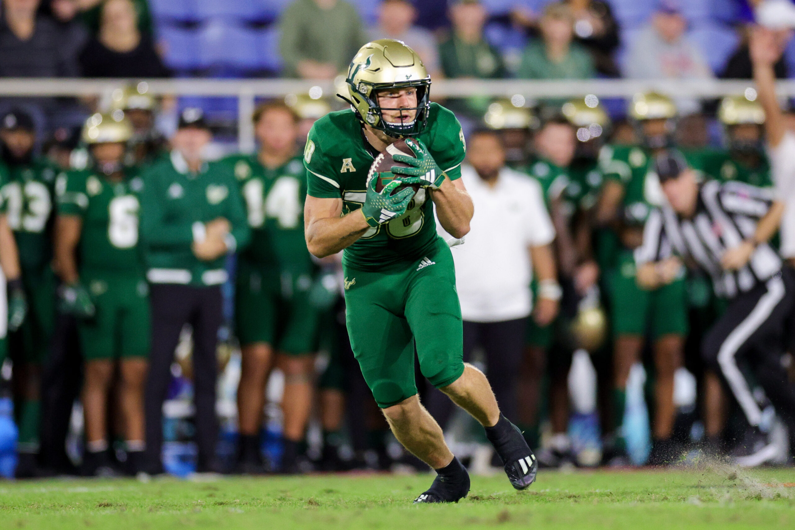 Dec 21, 2023; Boca Raton, FL, USA; South Florida Bulls wide receiver Sean Atkins (38) catches a pass for a touchdown against the Syracuse Orange in the third quarter during the RoofClaim.com Boca Raton Bowl at FAU Stadium. 