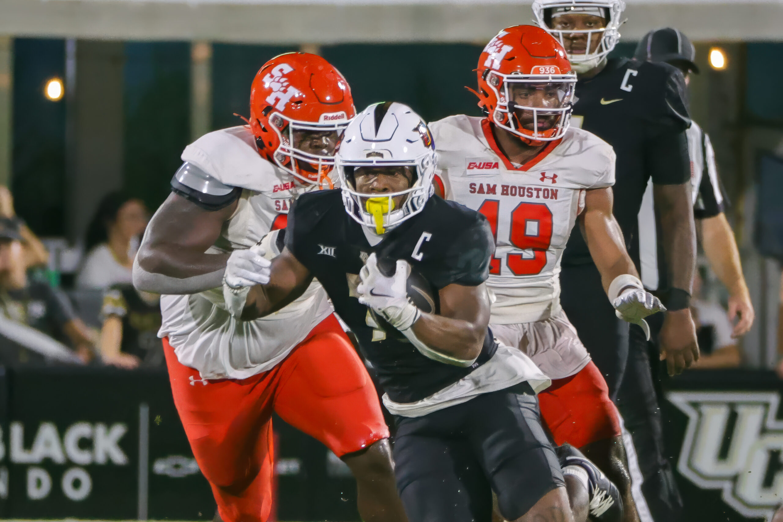 Sep 7, 2024; Orlando, Florida, USA; UCF Knights running back RJ Harvey (7) runs the ball during the second quarter against the Sam Houston State Bearkats at FBC Mortgage Stadium.
