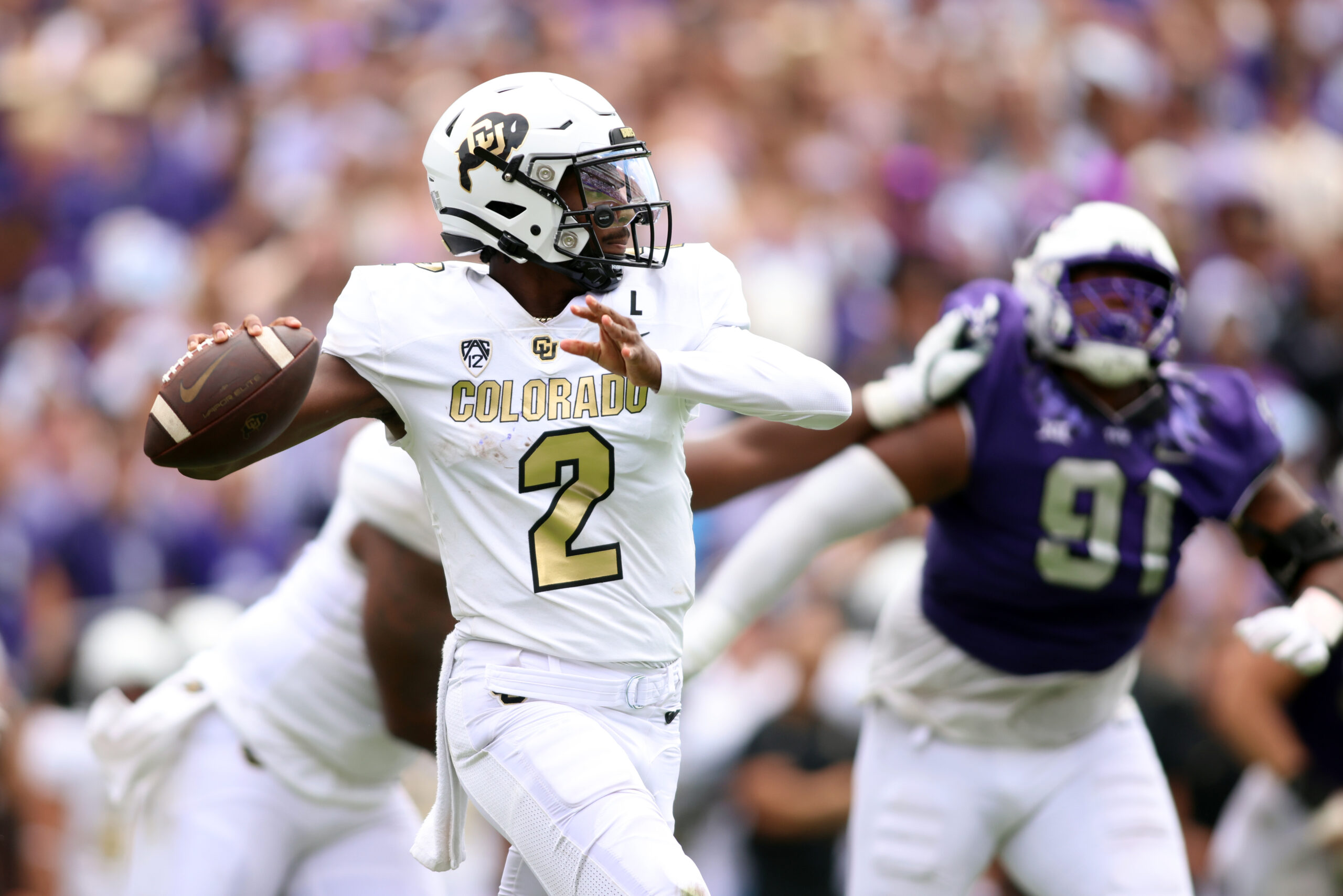 Sep 2, 2023; Fort Worth, Texas, USA; Colorado Buffaloes quarterback Shedeur Sanders (2) throws a pass in the second quarter against the TCU Horned Frogs at Amon G. Carter Stadium.