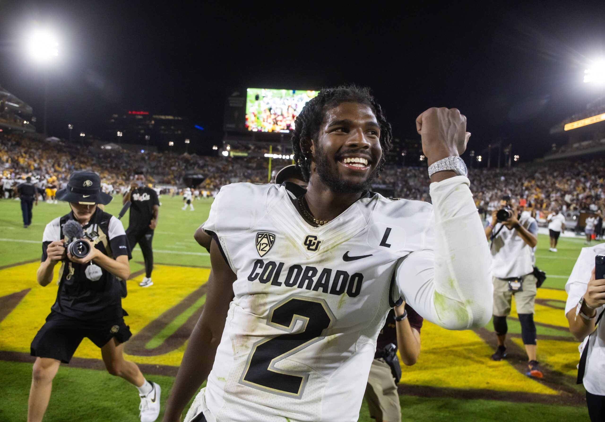 Oct 7, 2023; Tempe, Arizona, USA; Colorado Buffaloes quarterback Shedeur Sanders (2) celebrates after defeating the Arizona State Sun Devils at Mountain America Stadium, Home of the ASU Sun Devils.