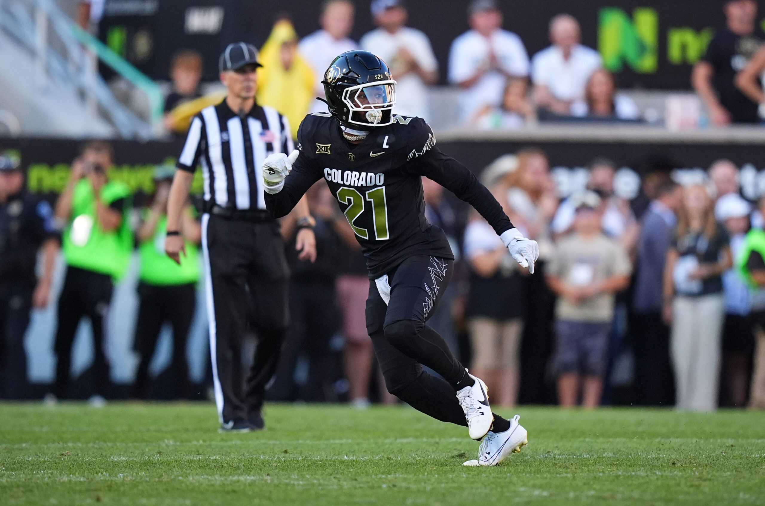 Sep 16, 2023; Boulder, Colorado, USA; Colorado Buffaloes safety Shilo Sanders (21) runs for a touchdown after making an interception against the Colorado State Rams during the first half at Folsom Field.