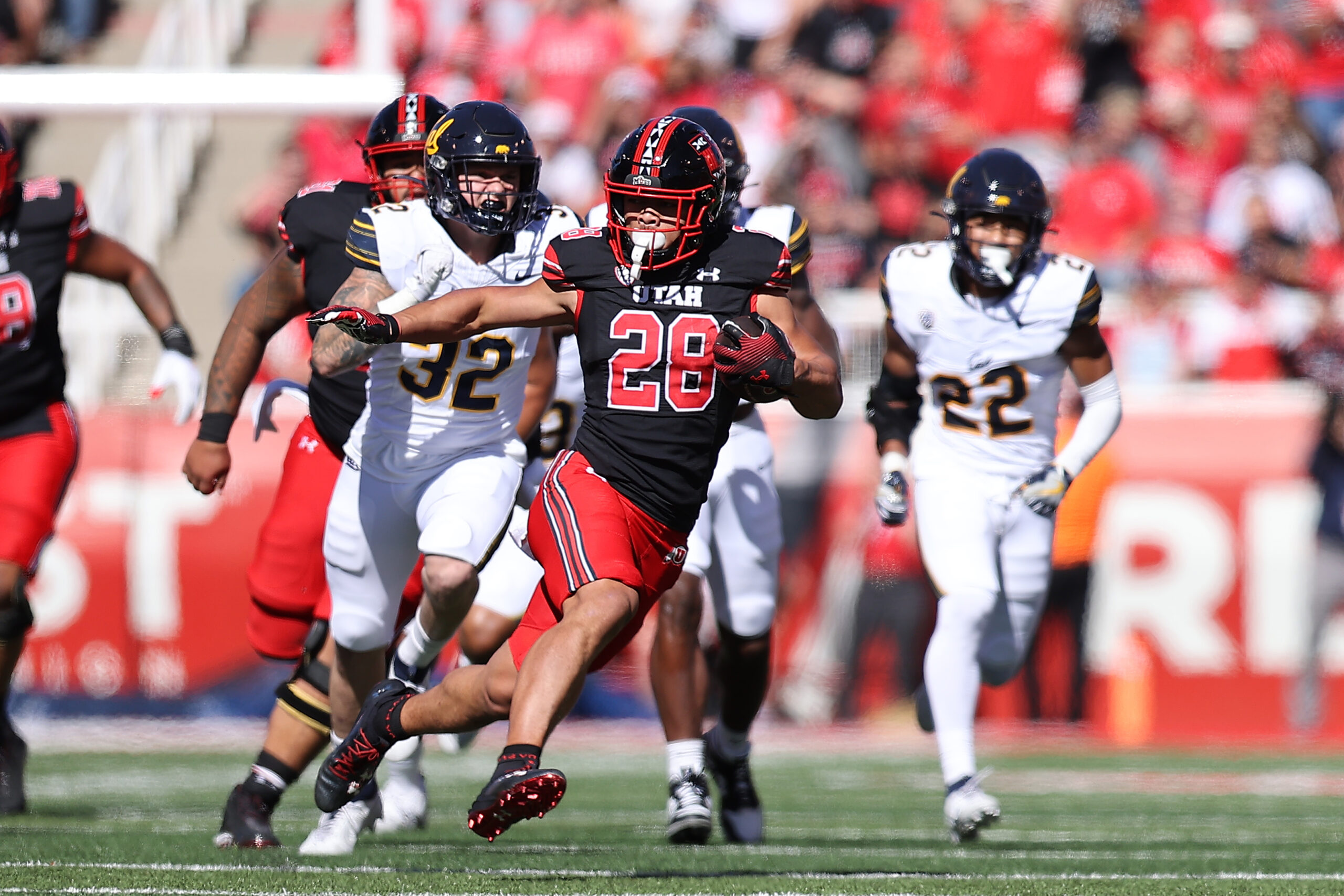 Oct 14, 2023; Salt Lake City, Utah, USA; Utah Utes safety Sione Vaki (28) runs the ball against the California Golden Bears in the first quarter at Rice-Eccles Stadium.