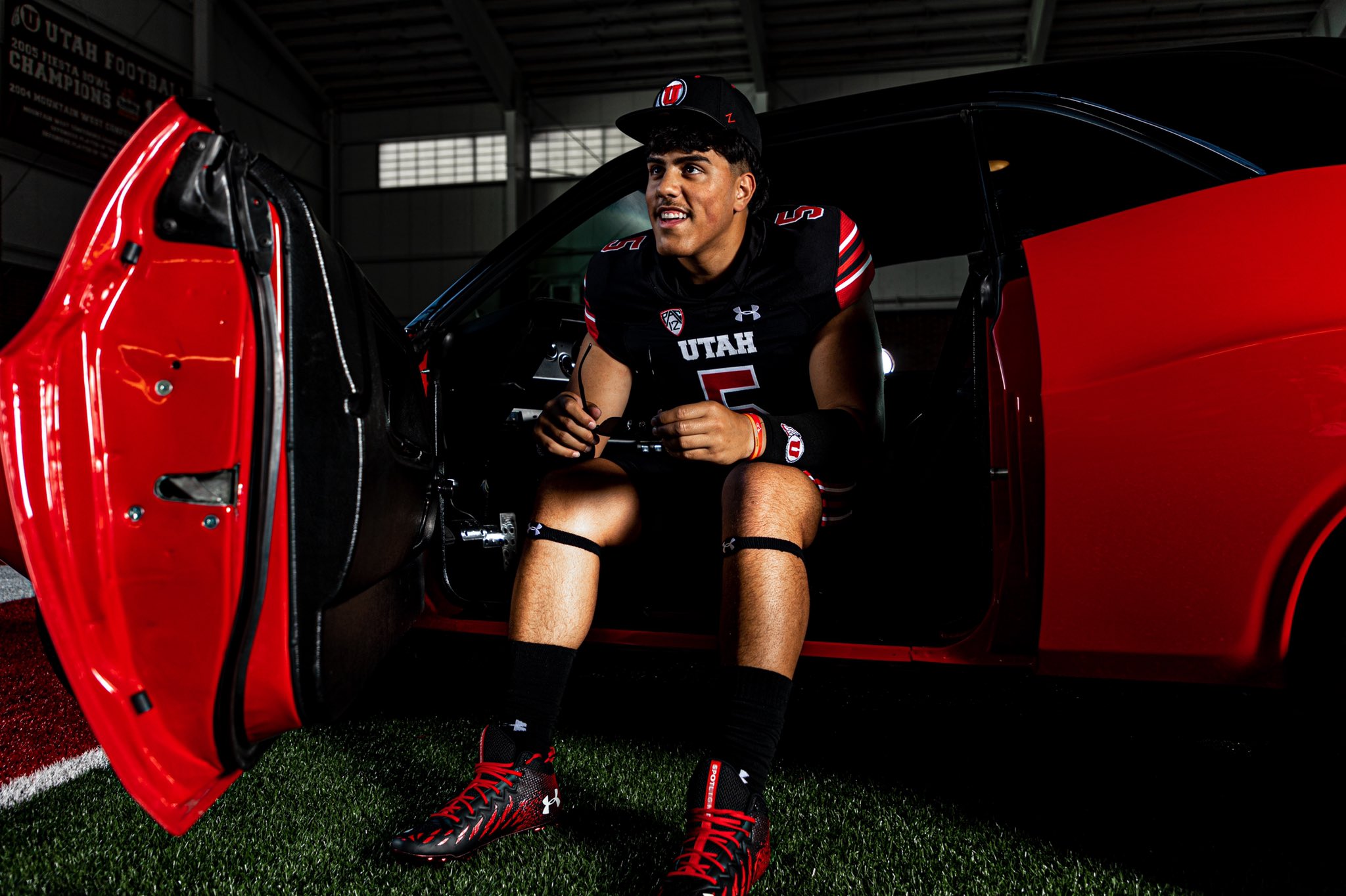 Spencer Fano sits in a car during his visit to the University of Utah