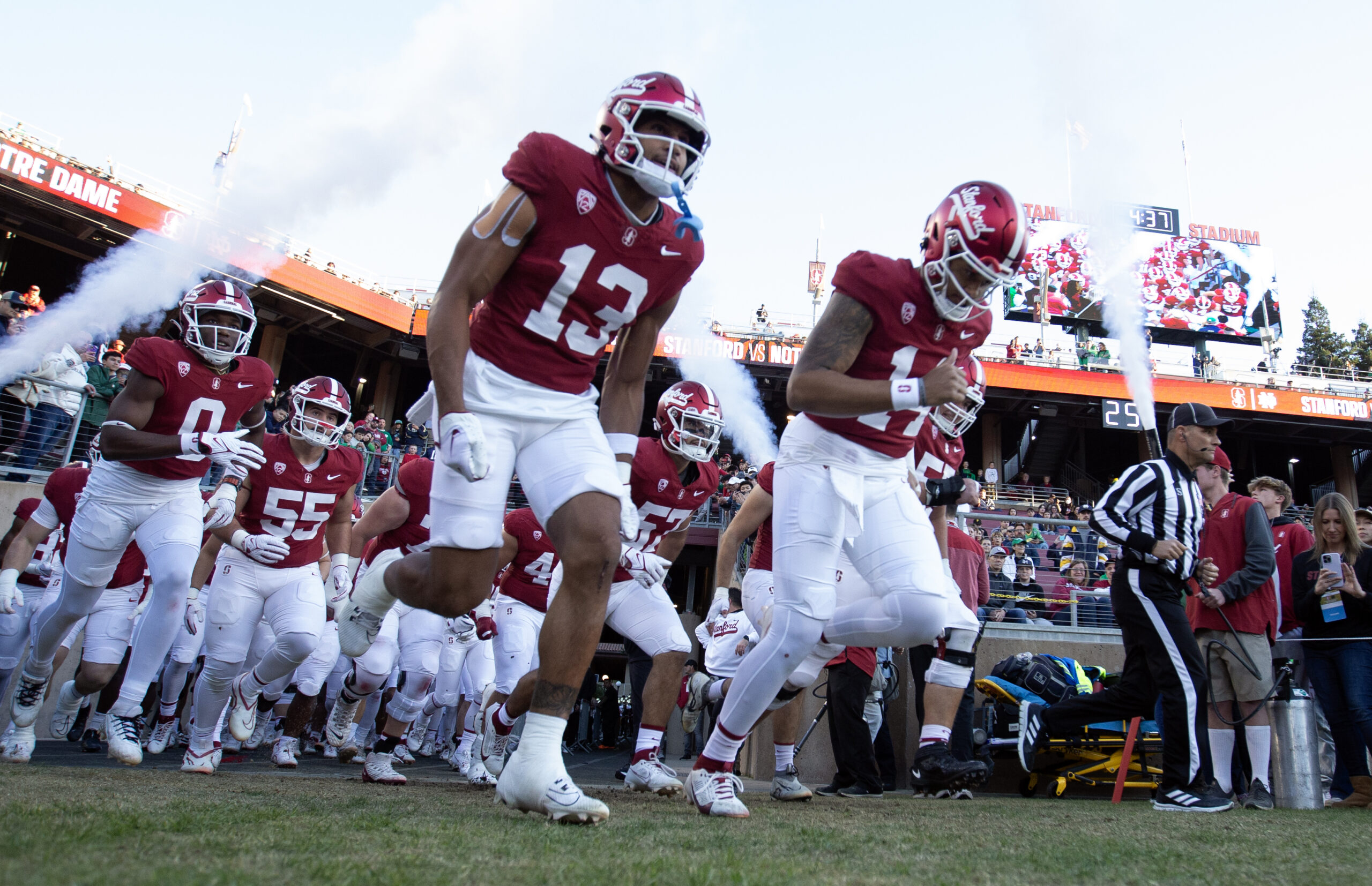 Nov 25, 2023; Stanford, California, USA; Stanford Cardinal players take the field to play the Notre Dame Fighting Irish at Stanford Stadium.