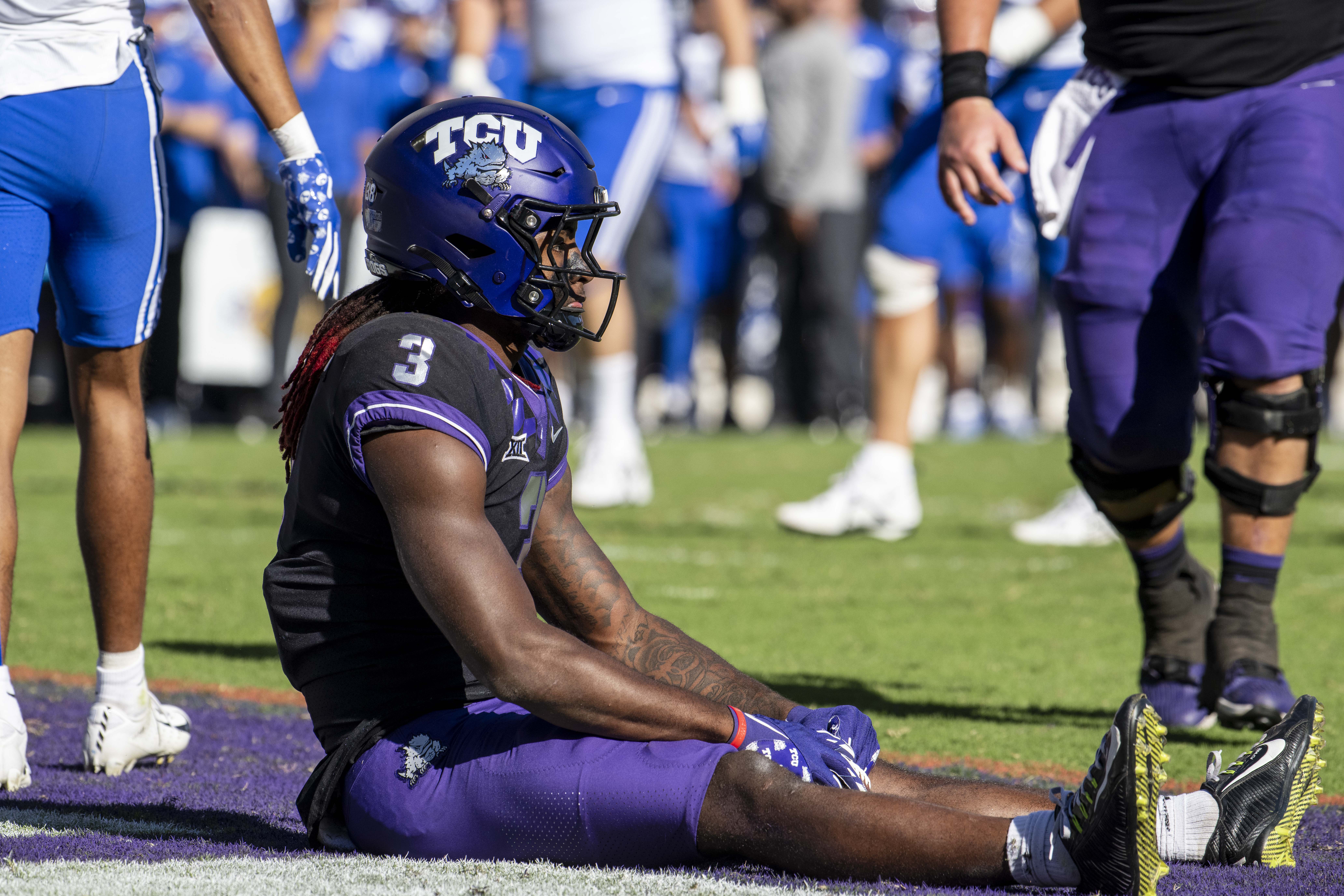 Oct 14, 2023; Fort Worth, Texas, USA; TCU Horned Frogs wide receiver Savion Williams (3) sits on the field after he scores a touchdown against the Brigham Young Cougars during the game at Amon G. Carter Stadium.