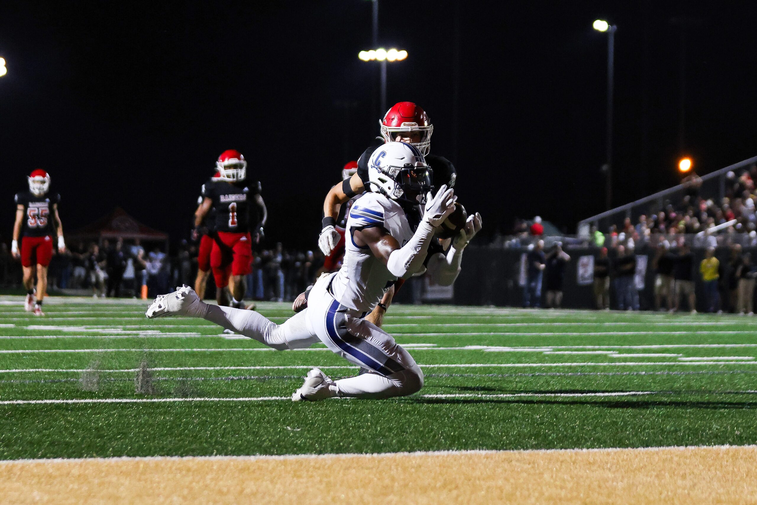 Cavilars receiver #3 Thomas Blackshear catches a long pass by #4 Jake Merklinger and is called down at the 2-yard line.