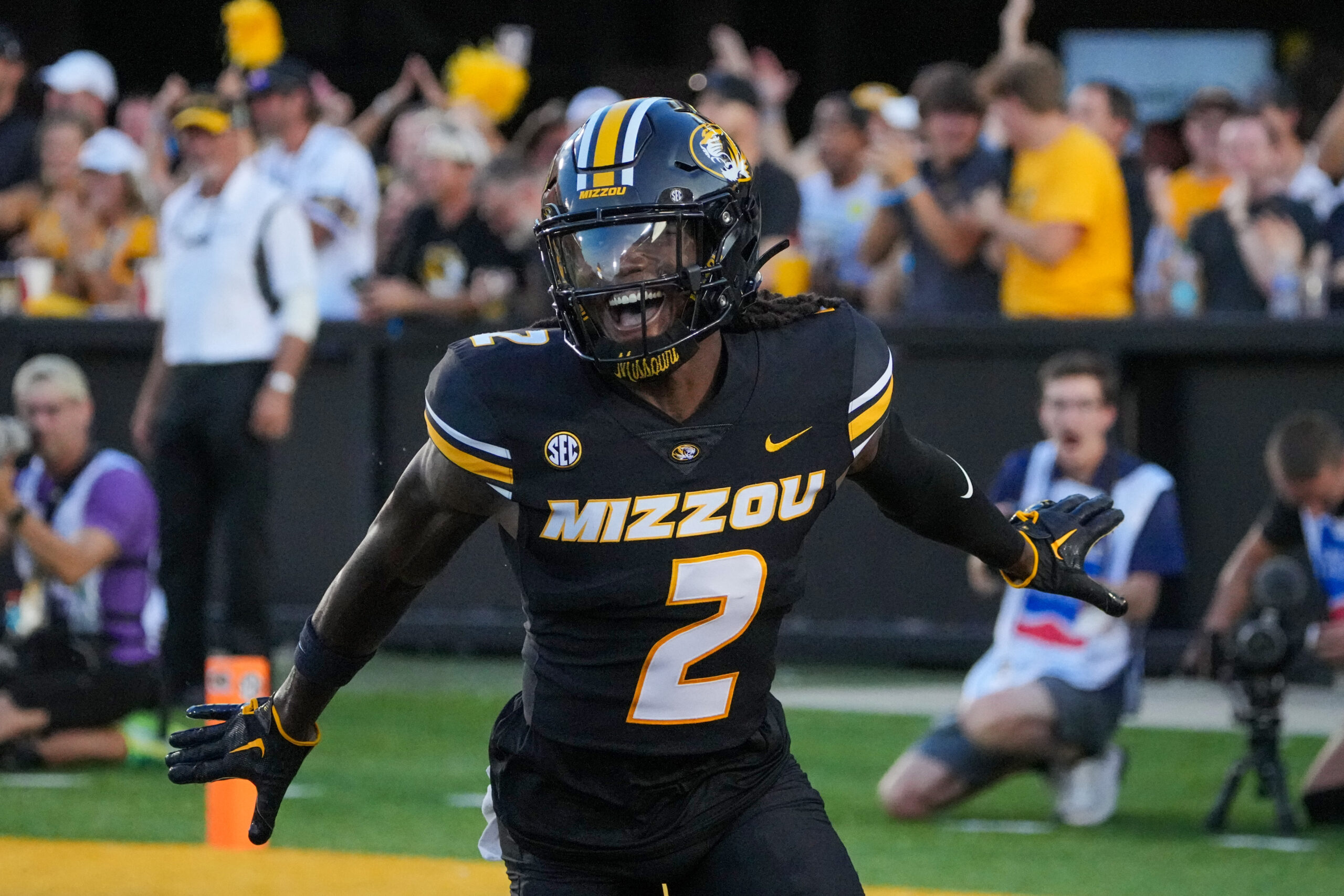 Aug 29, 2024; Columbia, Missouri, USA; Missouri Tigers cornerback Toriano Pride Jr. (2) celebrates after scoring against the Murray State Racers on a pick six during the first half at Faurot Field at Memorial Stadium.