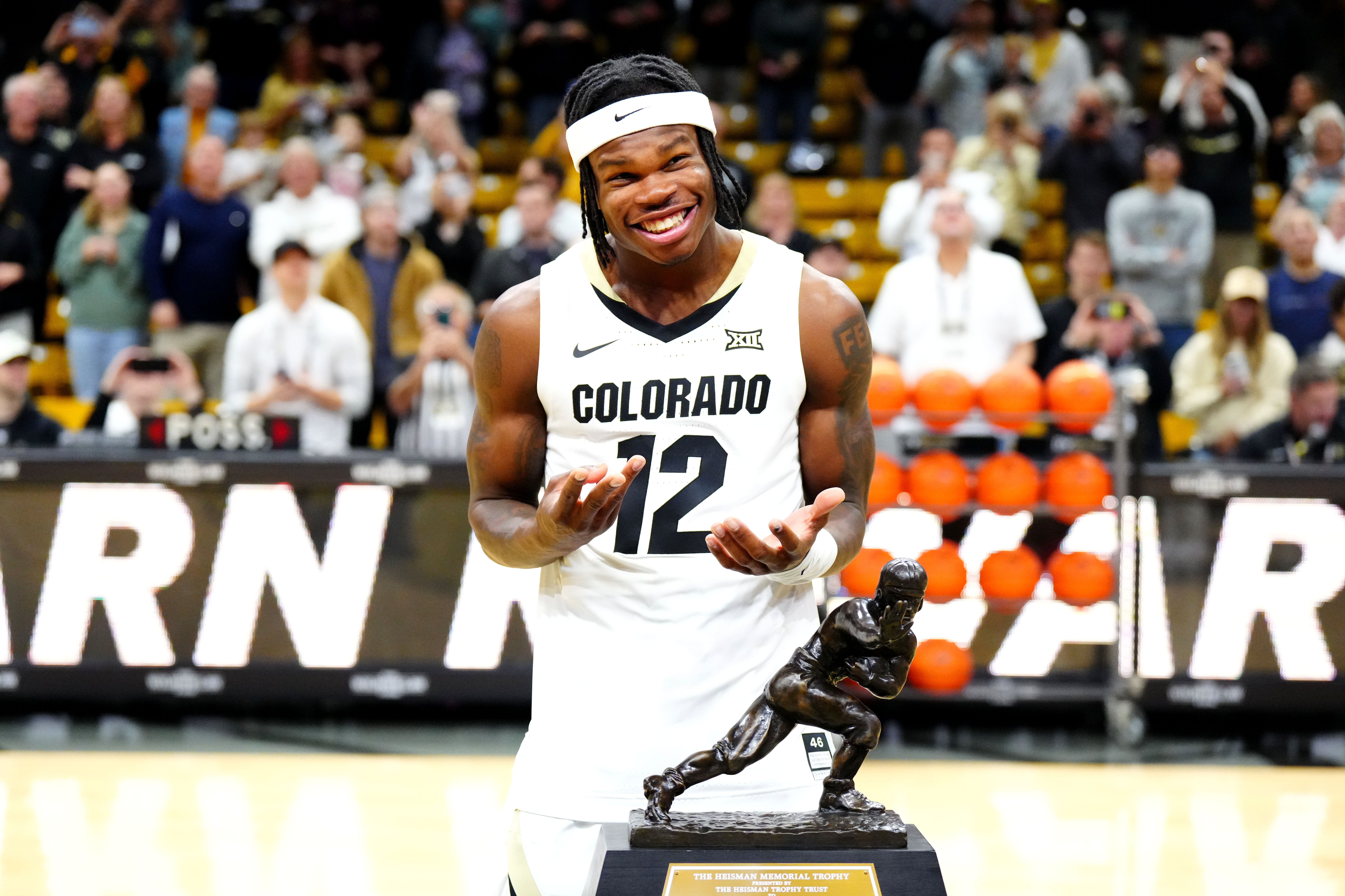 Dec 21, 2024; Boulder, Colorado, USA; Colorado Buffaloes Heisman trophy winner Travis Hunter before the game against the Bellarmine Knights at CU Events Center.