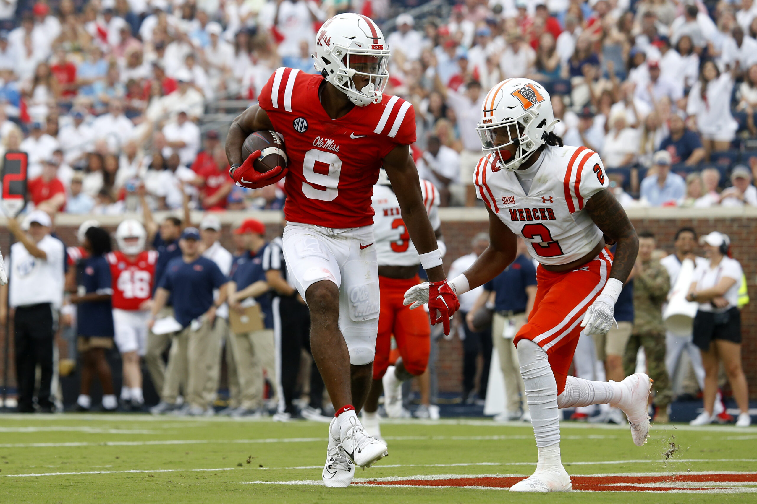 Sep 2, 2023; Oxford, Mississippi, USA; Mississippi Rebels wide receiver Tre Harris (9) scores his fourth touchdown of the day during the third quarter against the Mercer Bears at Vaught-Hemingway Stadium.